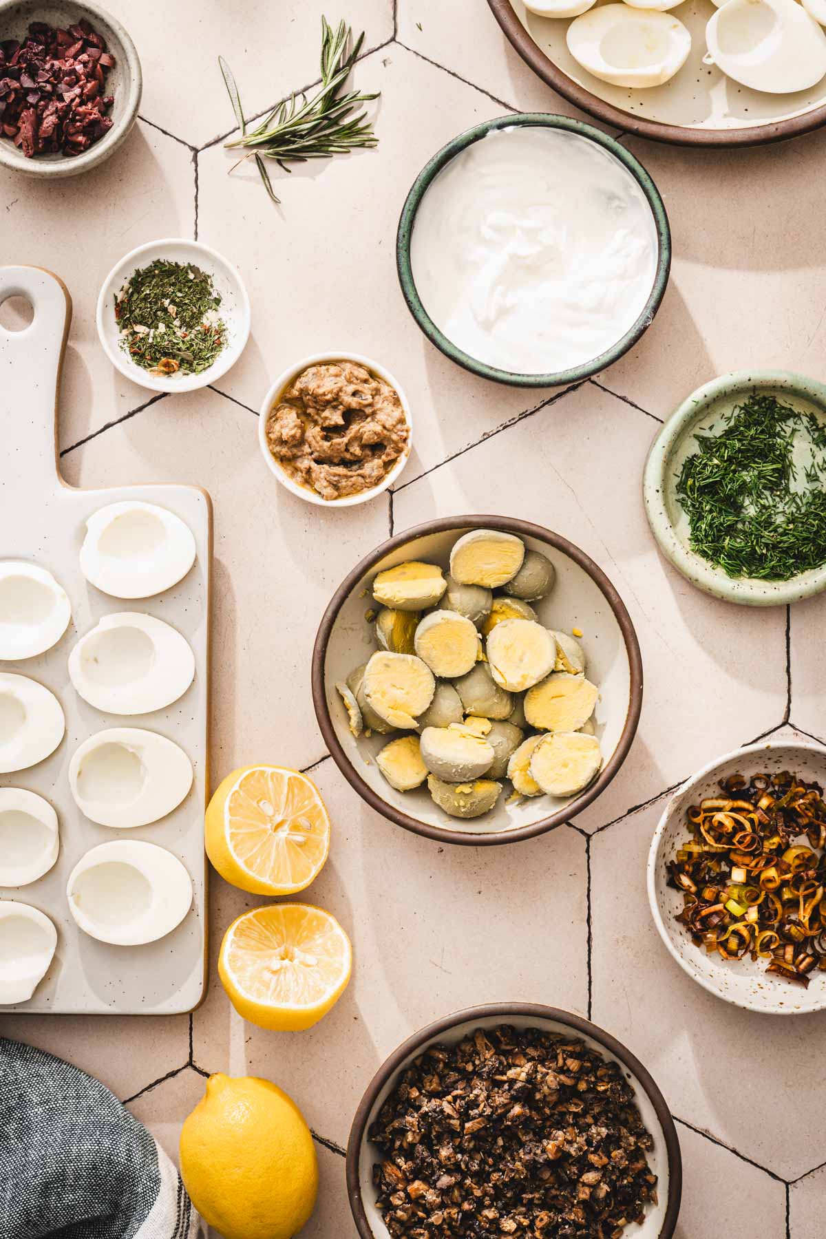 cut up eggs, egg yolks in a bowl