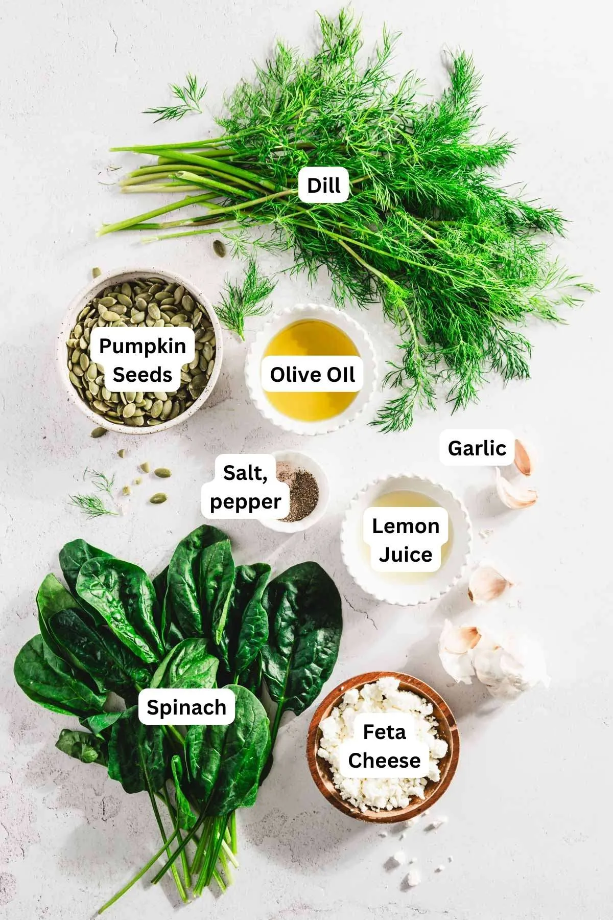 ingredients to make dill pesto with name tags