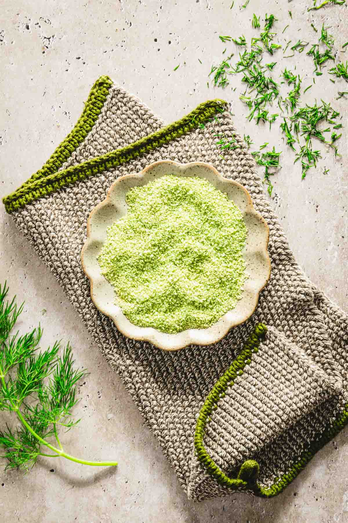 dill salt in a shallow dish placed on a napkin