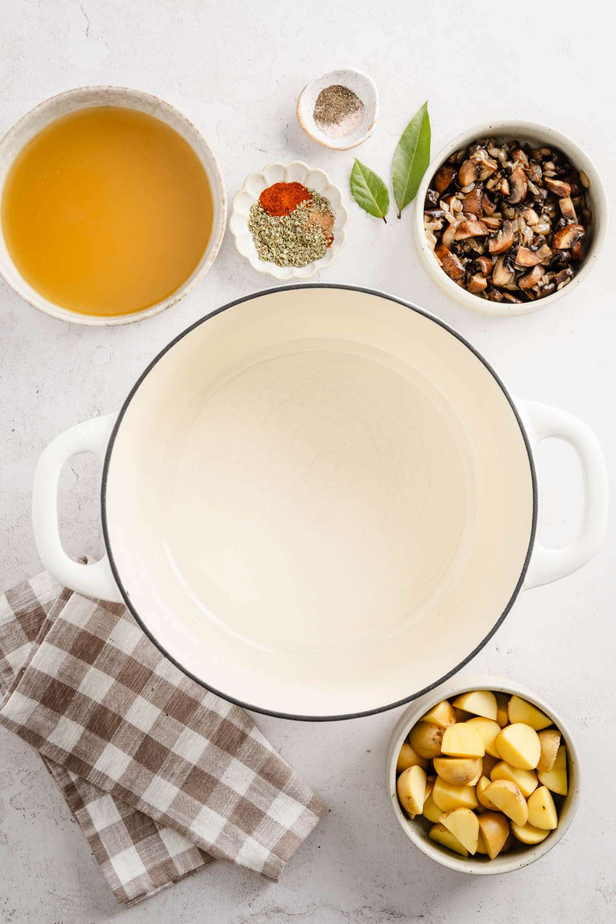 large soup pan with ingredients to make zupa koperkowa