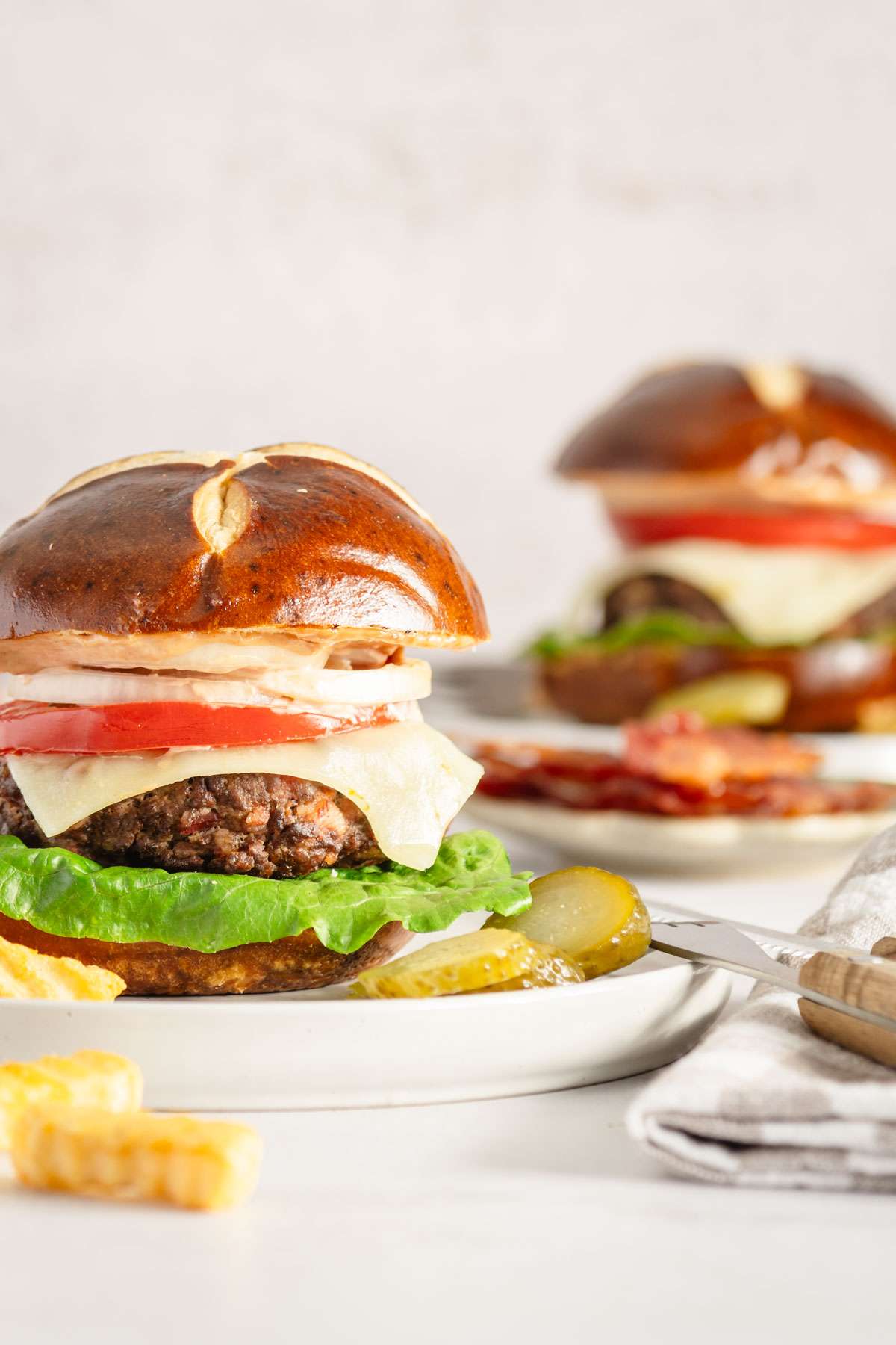 two burgers served on plates