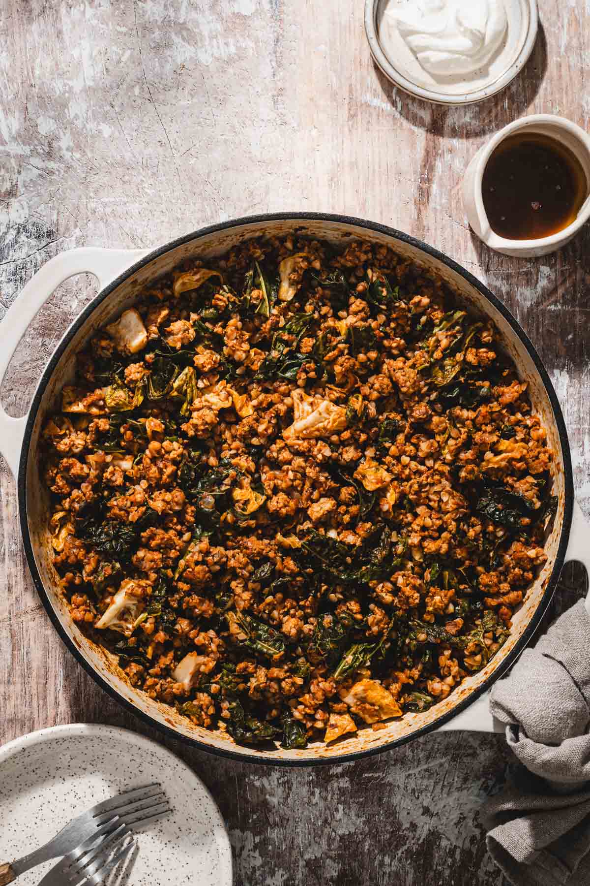 skillet with cooked cabbage and meat