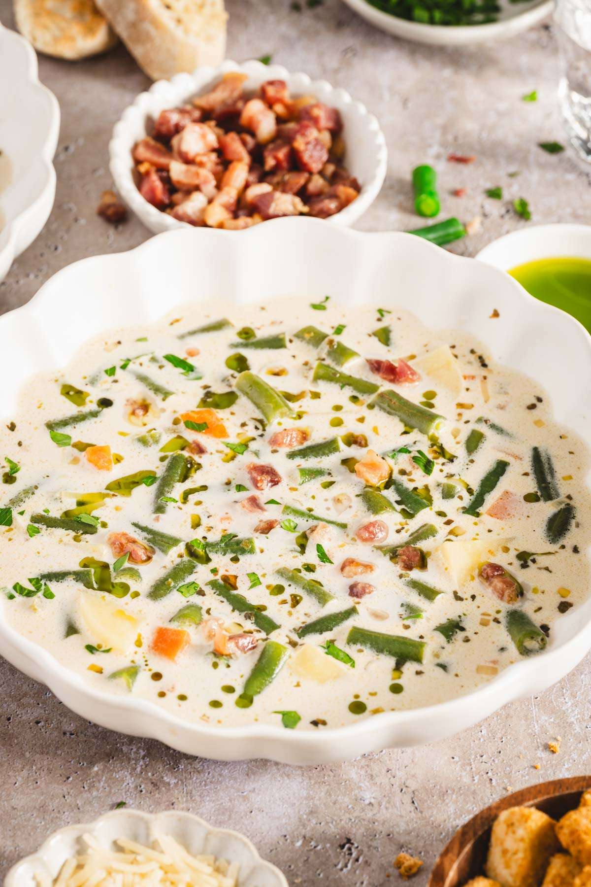 view of bowl with green bean soup, close up