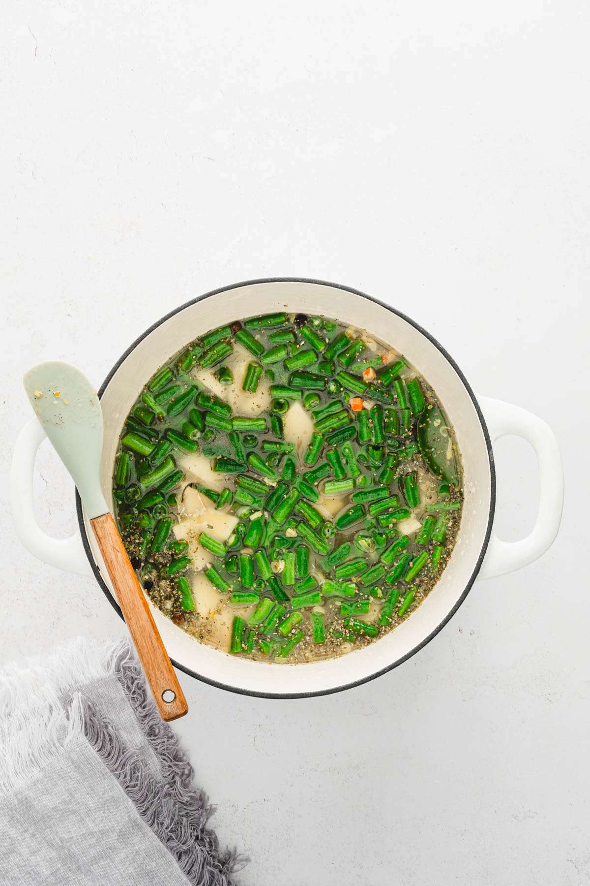 soup pan with green bean soup ingredients