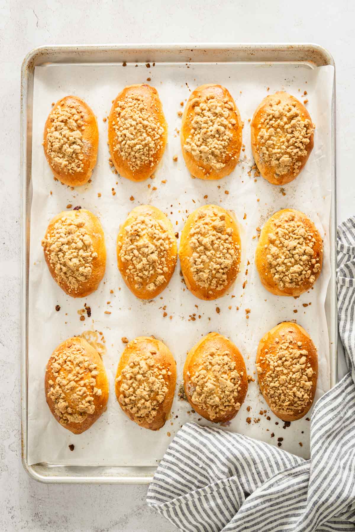 baked jagodzianki on a baking sheet