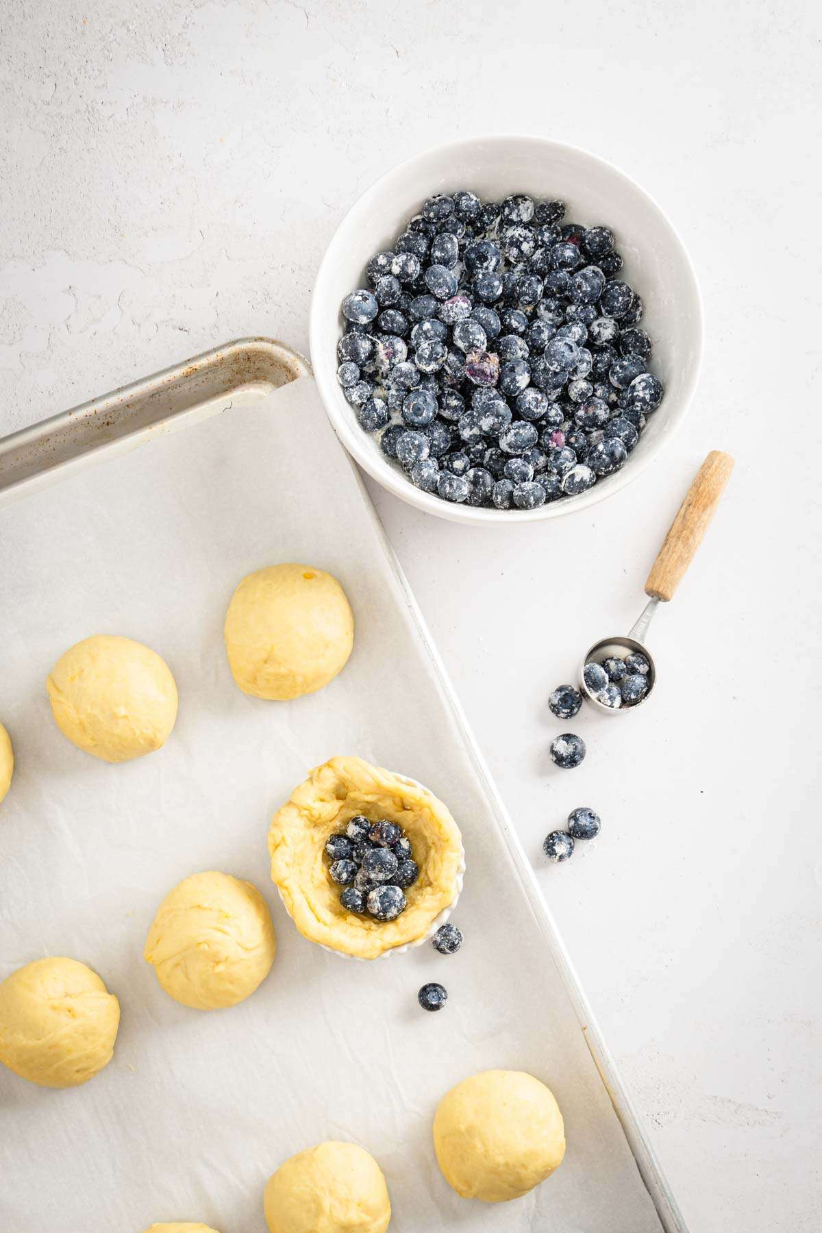 dough for jagodzianki filled with blueberries