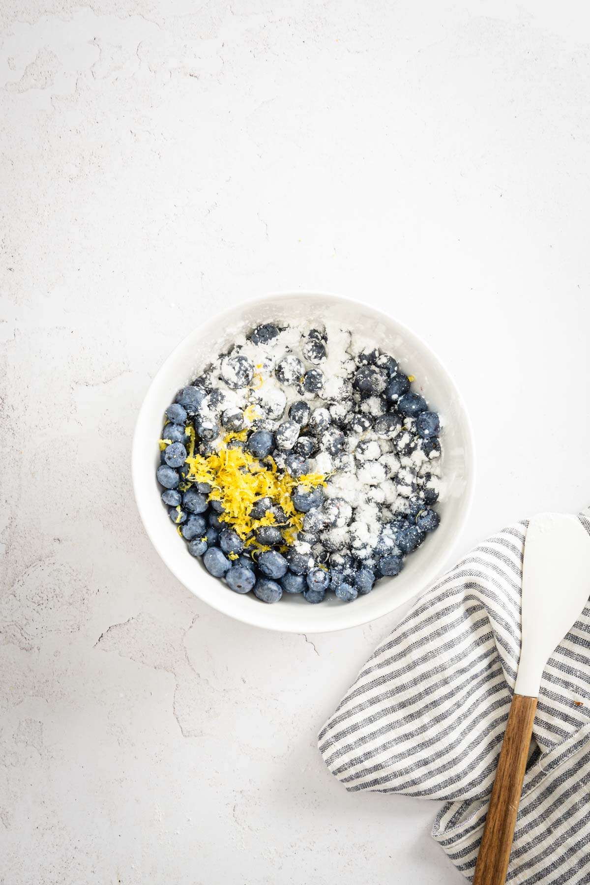 bowl with blueberries with starch and zest