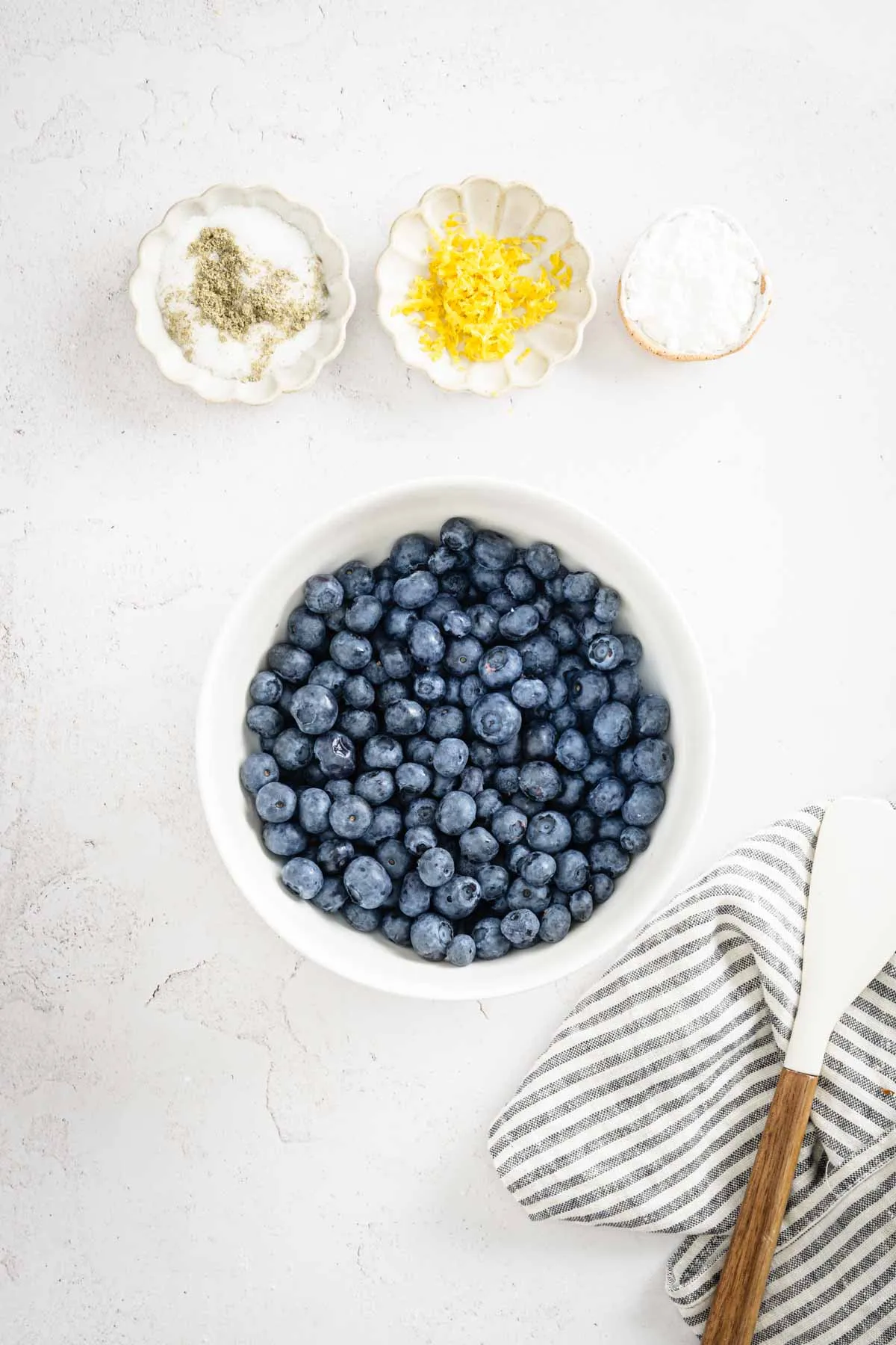 bowl with fresh blueberries, dish with starch, lavender sugar and zest