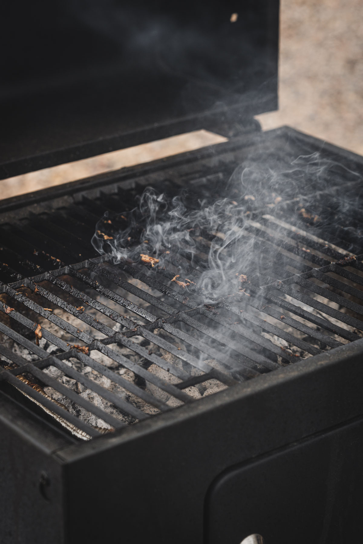 smoke coming out of the grill