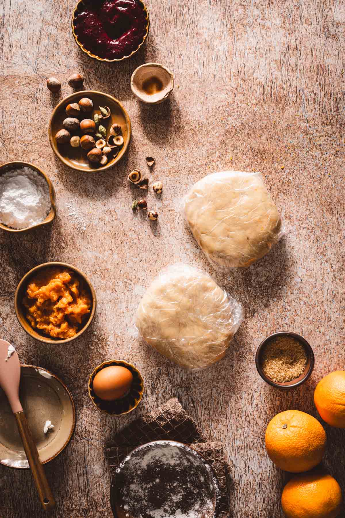 two dough disksin a plastic wrap