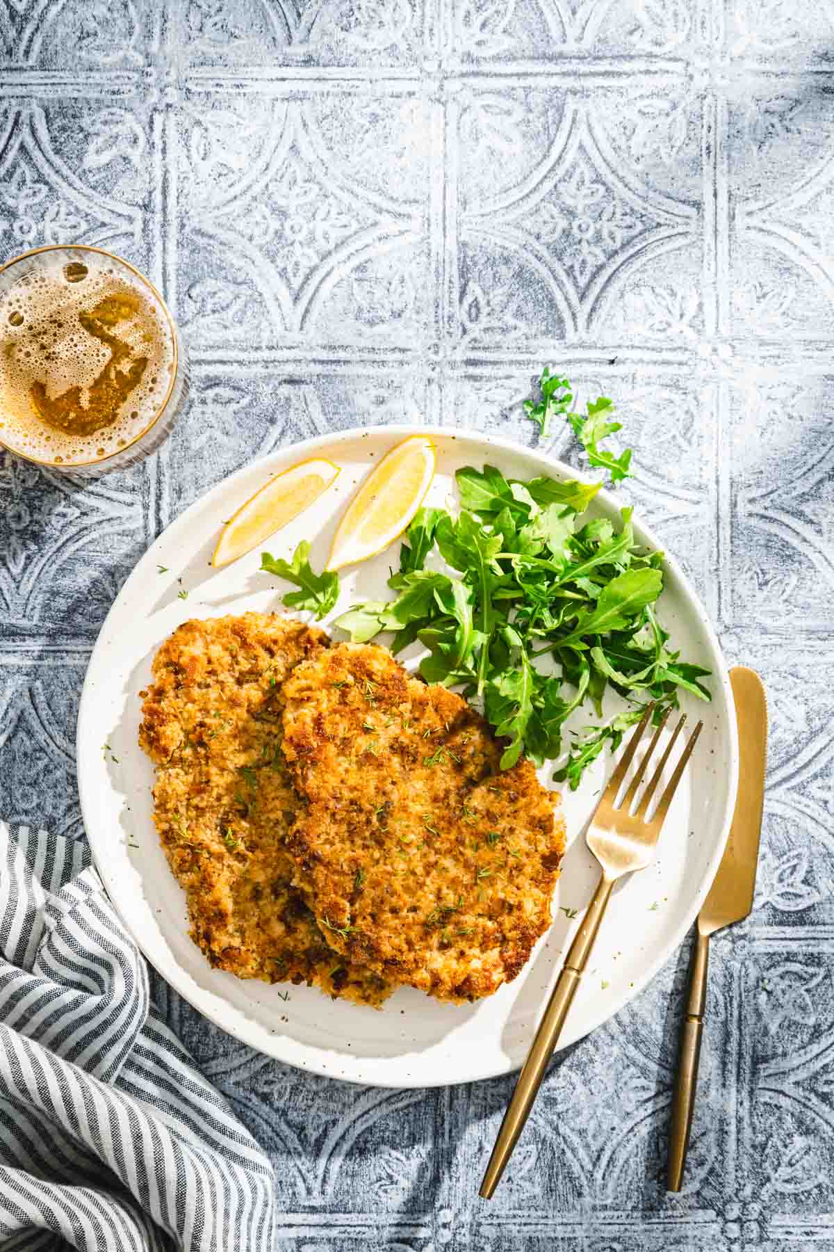 pork chops on a plate with salad