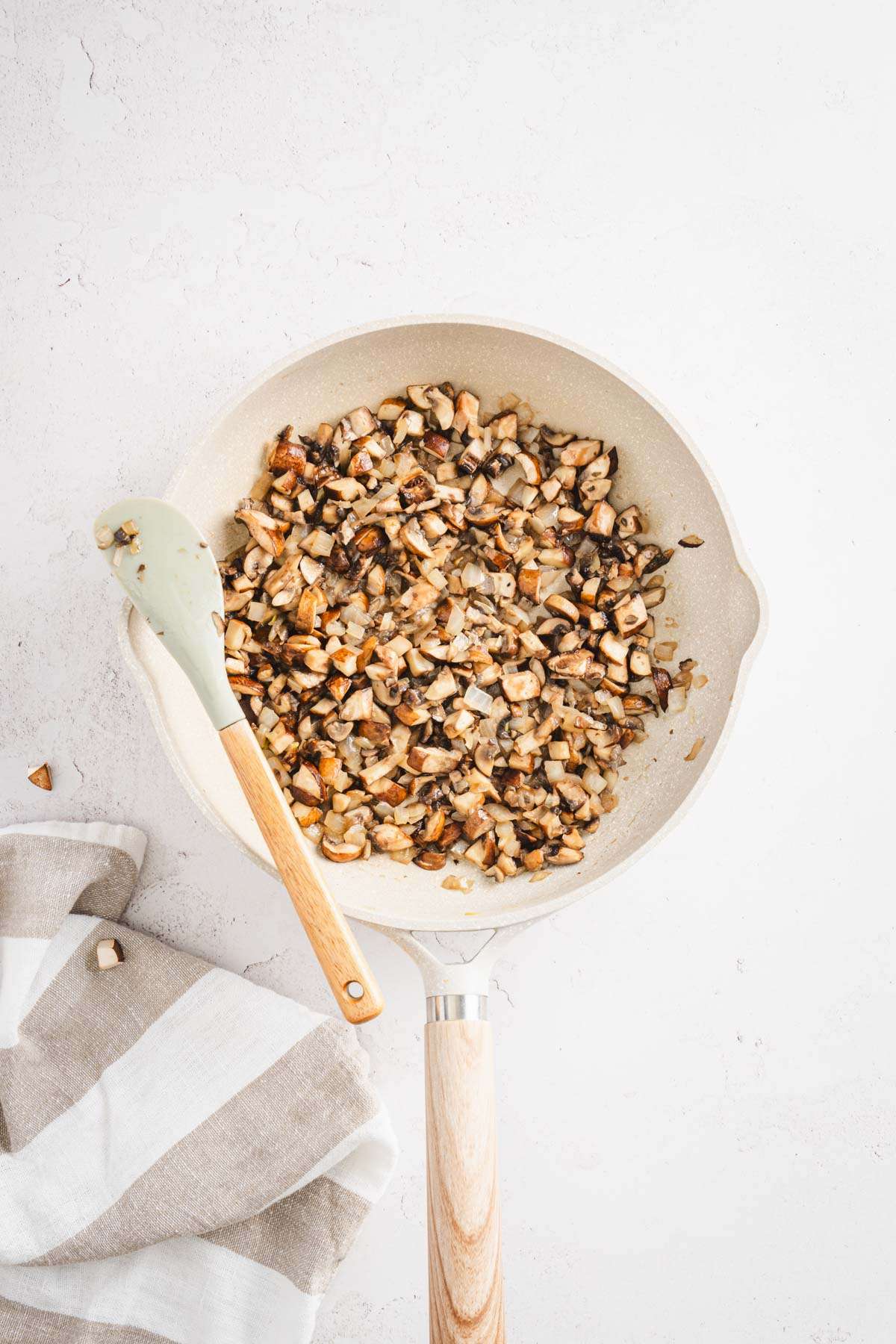 skillet with cooked mushrooms