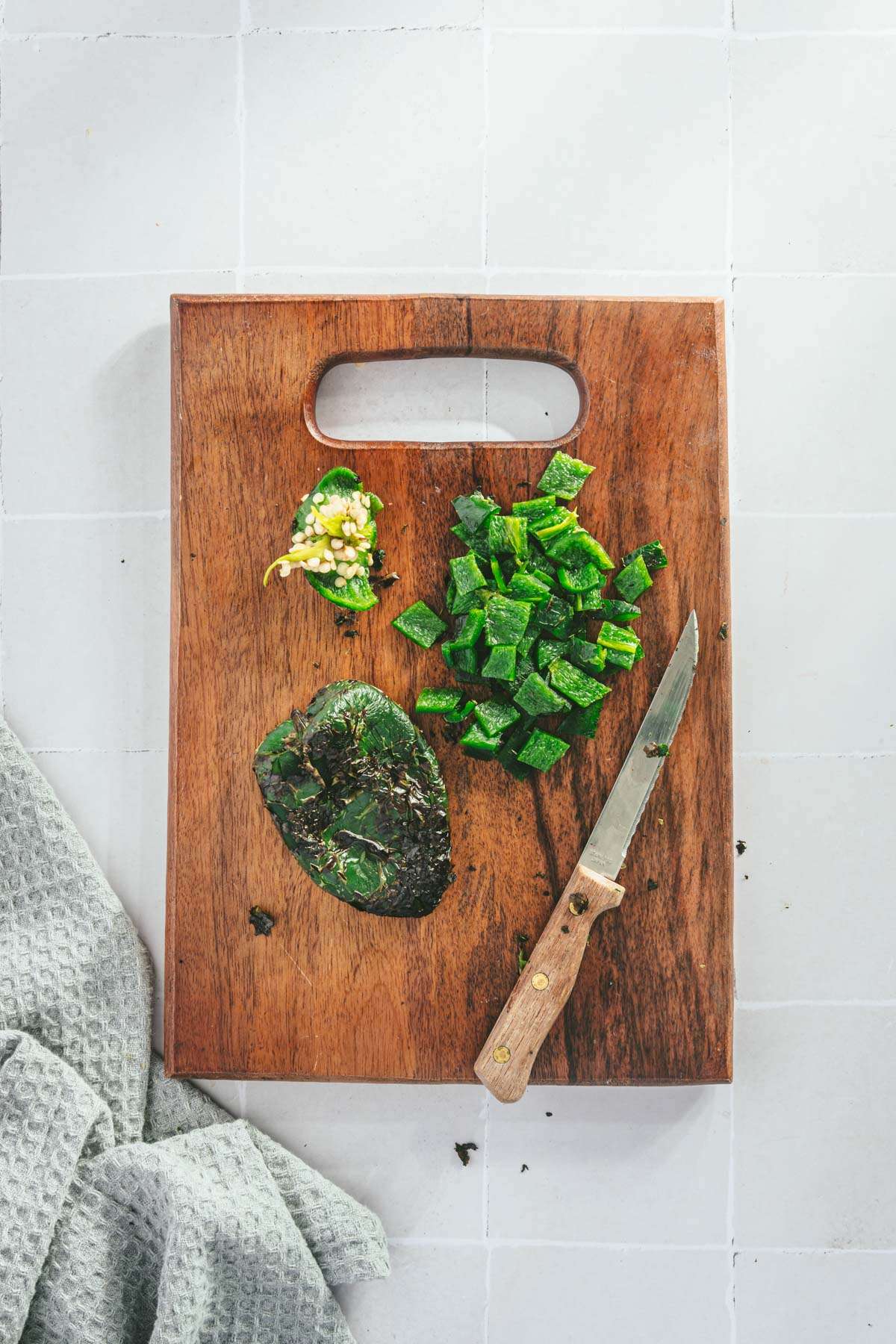 poblano pepper on a cutting board