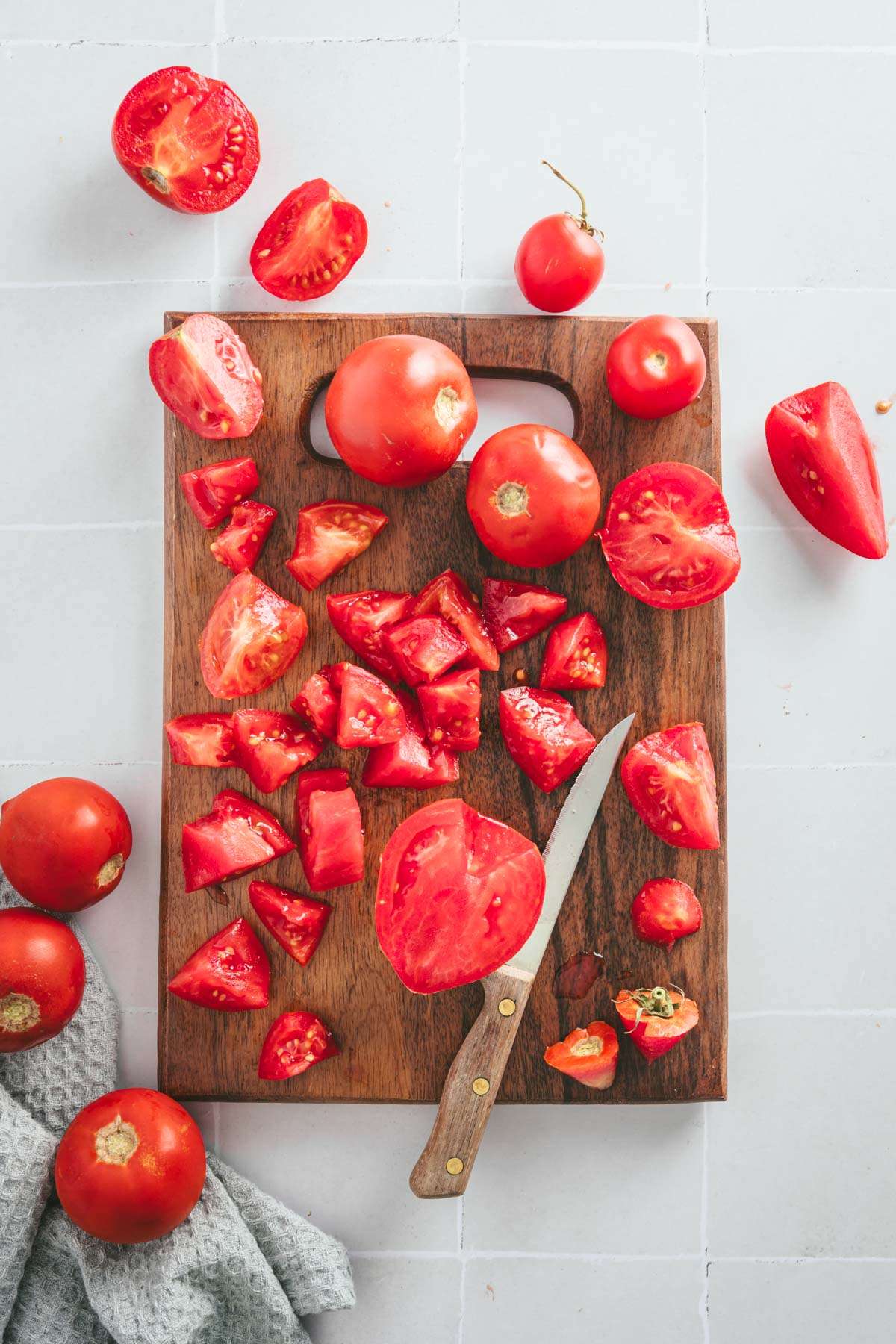 tomatoes on a cutting board