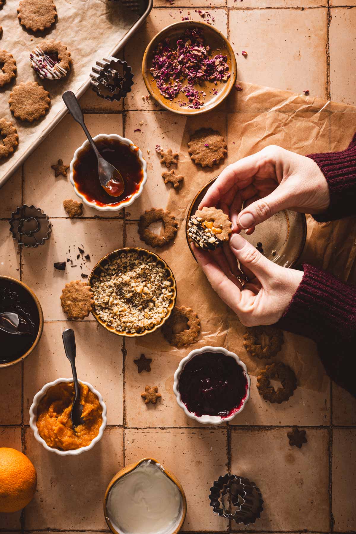 hands in frame hgolding finished cookie