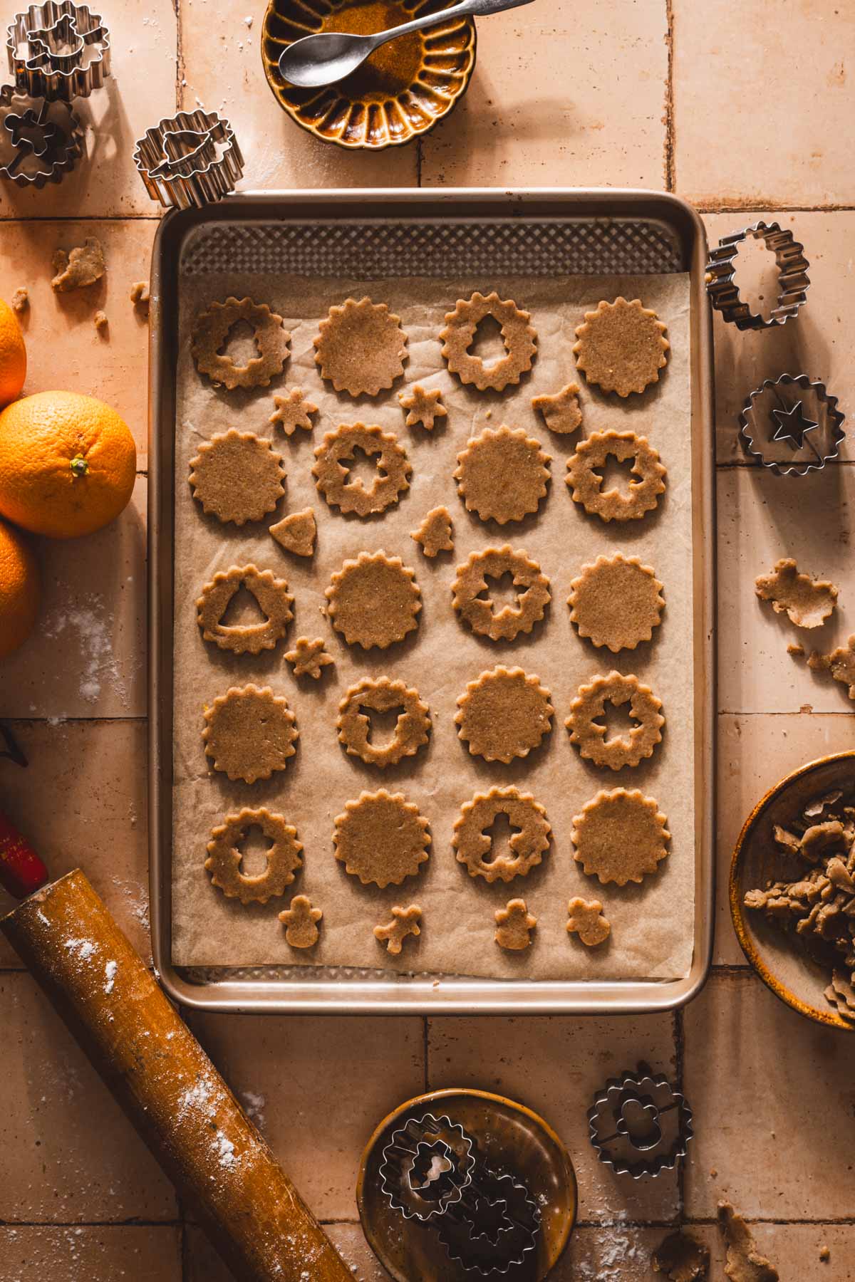 cut out cookies on a baking sheet