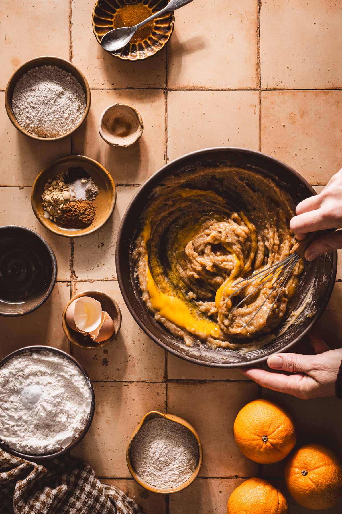 hands in frame mixing the wet ing