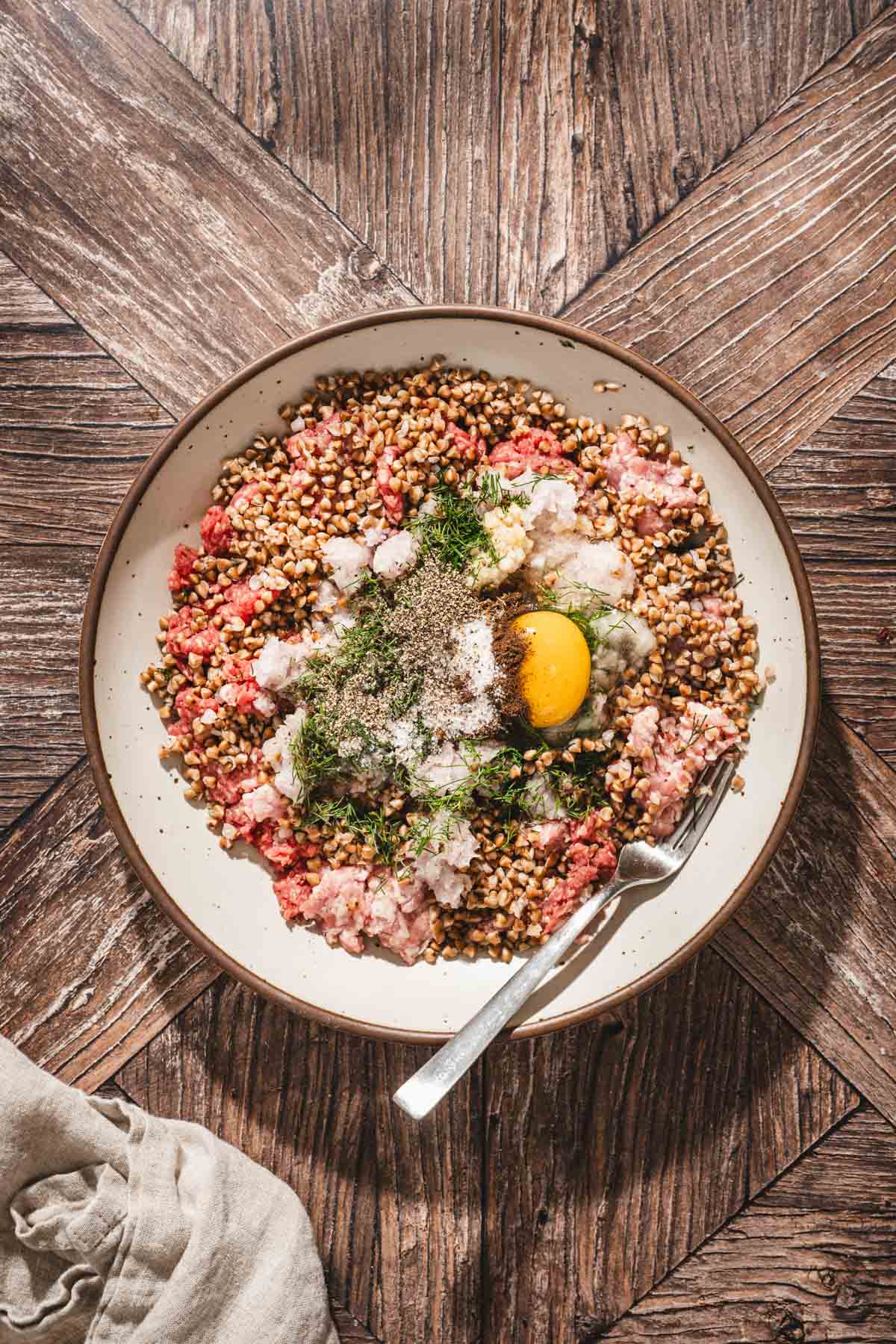 ing to make meatballs in a large mixing bowl