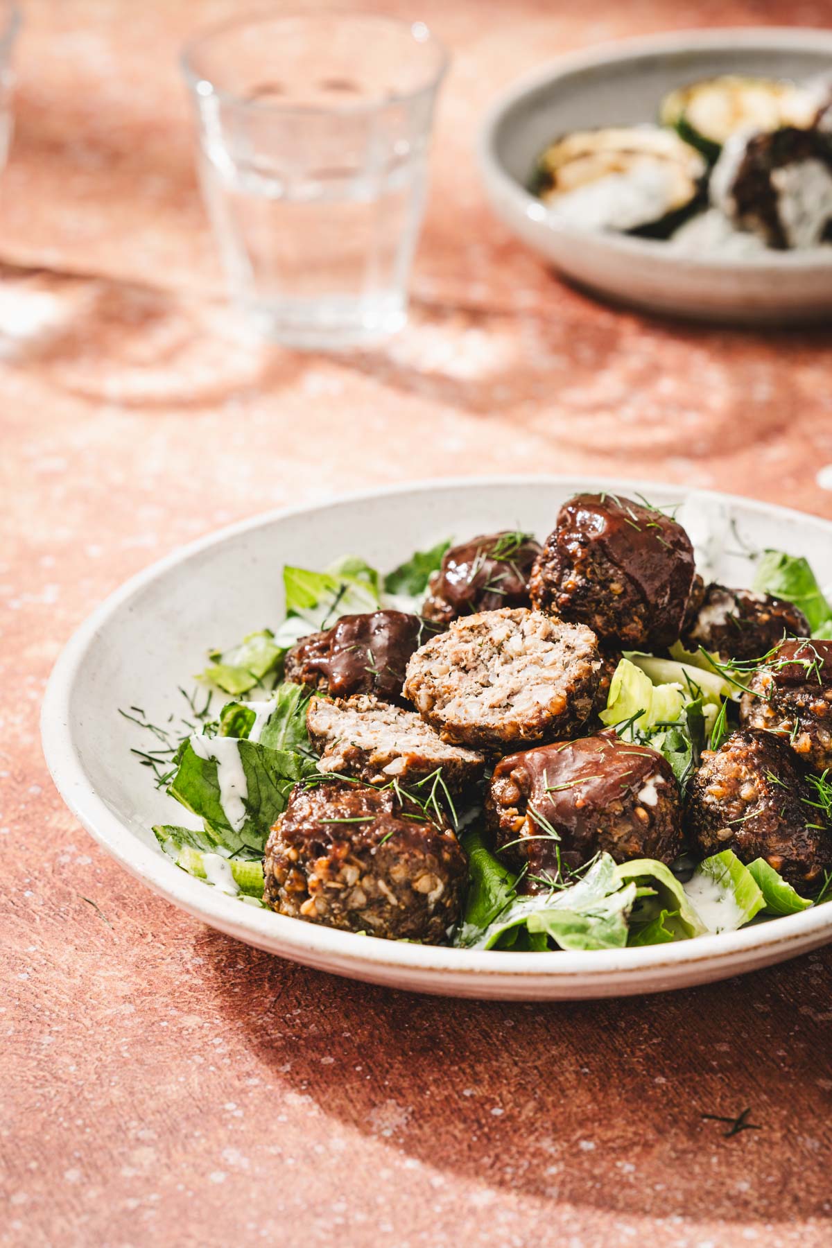 plate with meatballs and lettuce