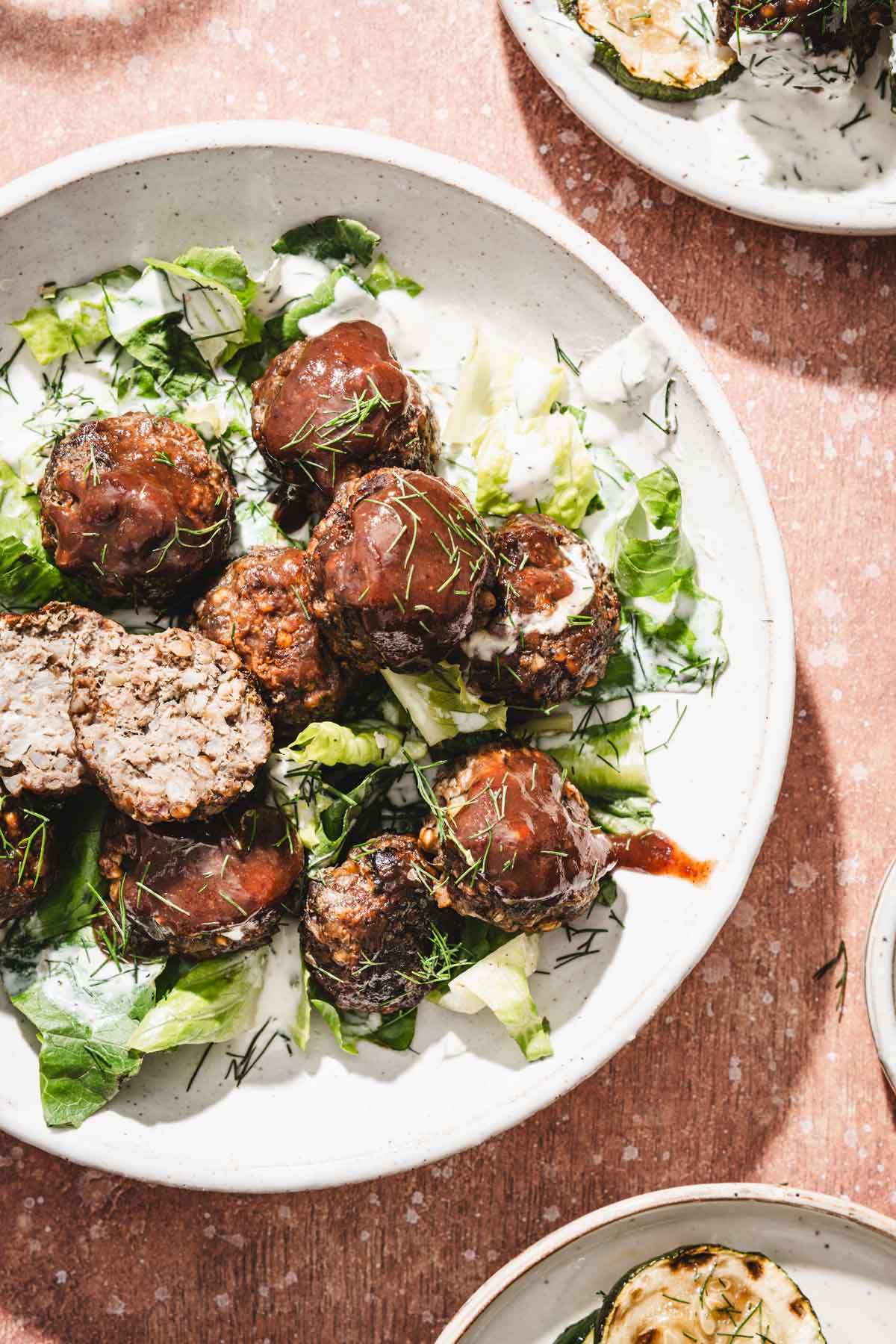 pleate with meatballs, other plates around