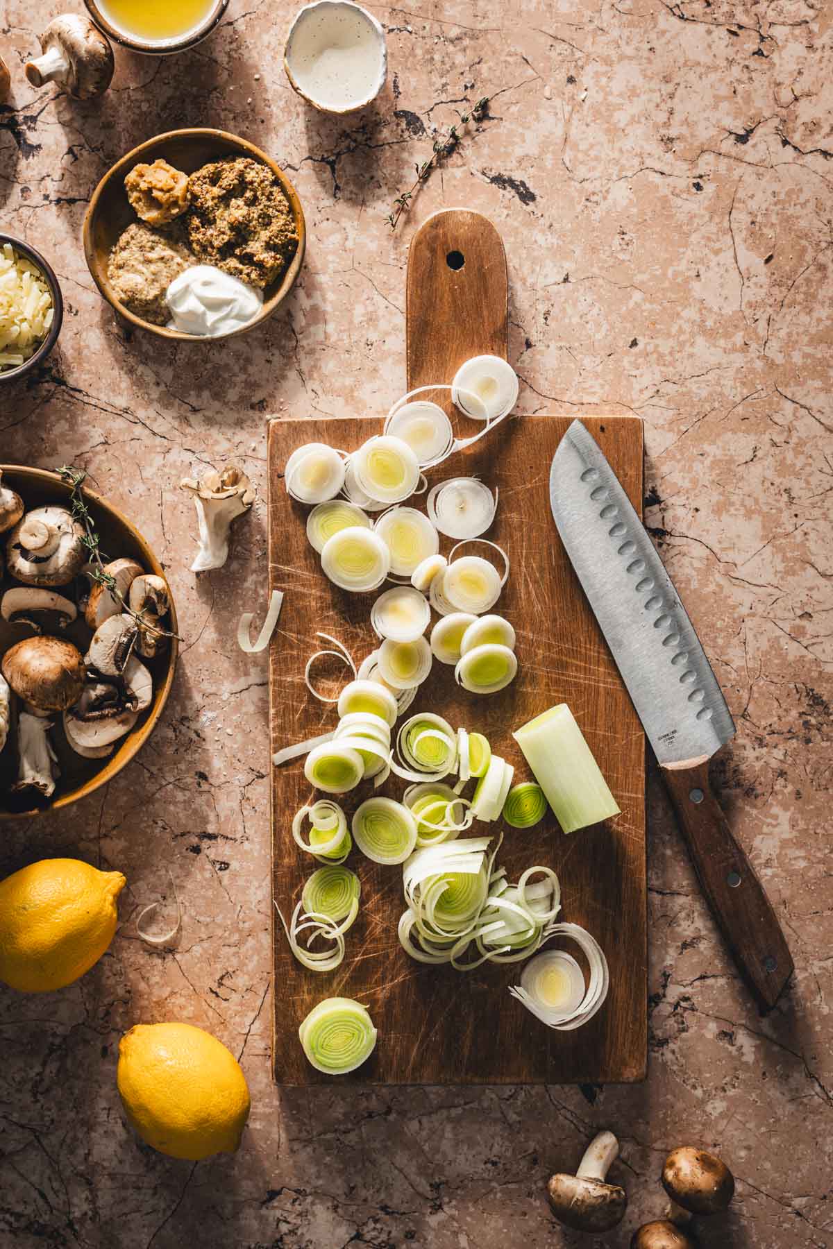 leeks sliced on a cutting board