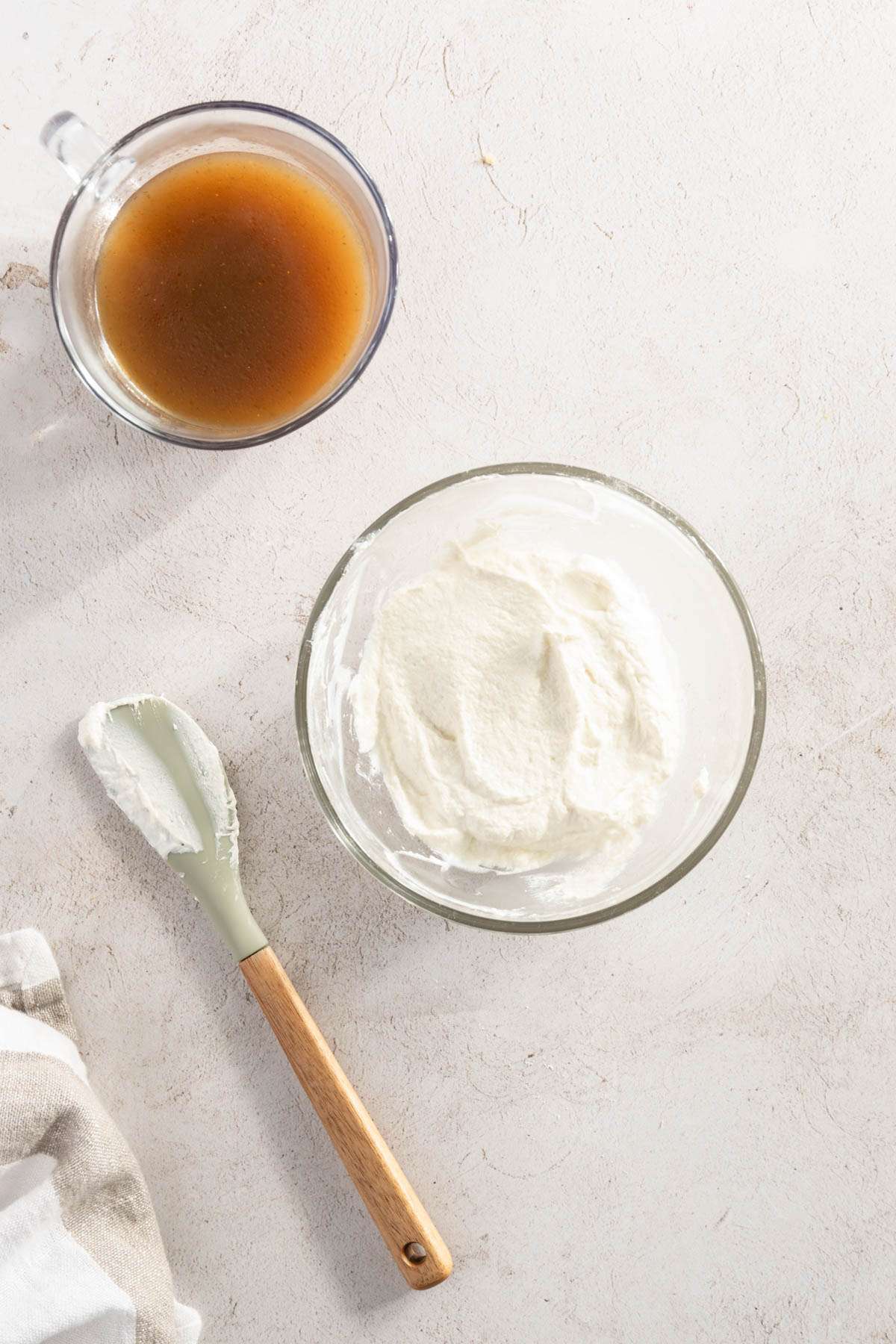 bowl with Sour Cream sauce , bowl with mushroom water, spatula