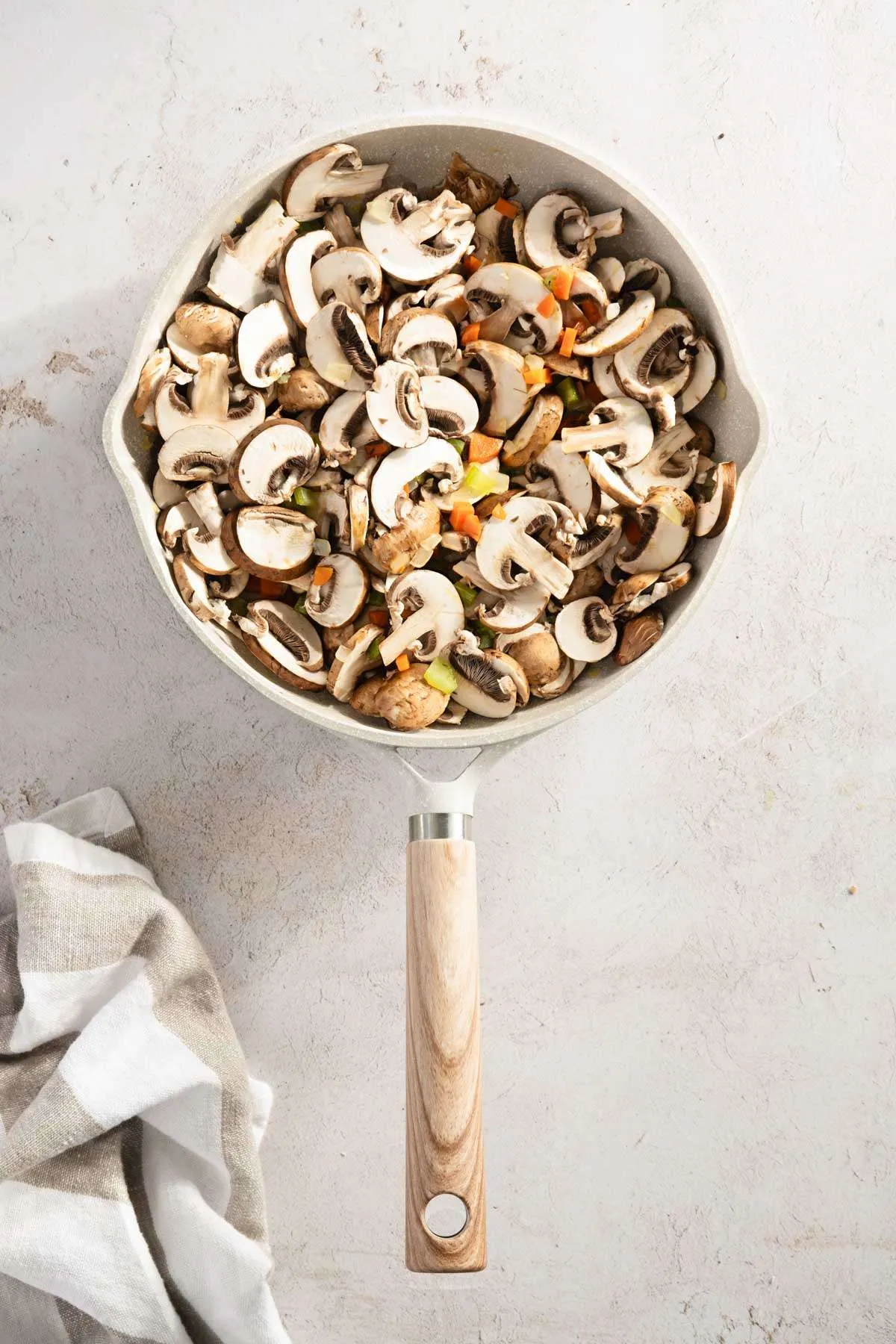 frying pan with mushrooms and veggies