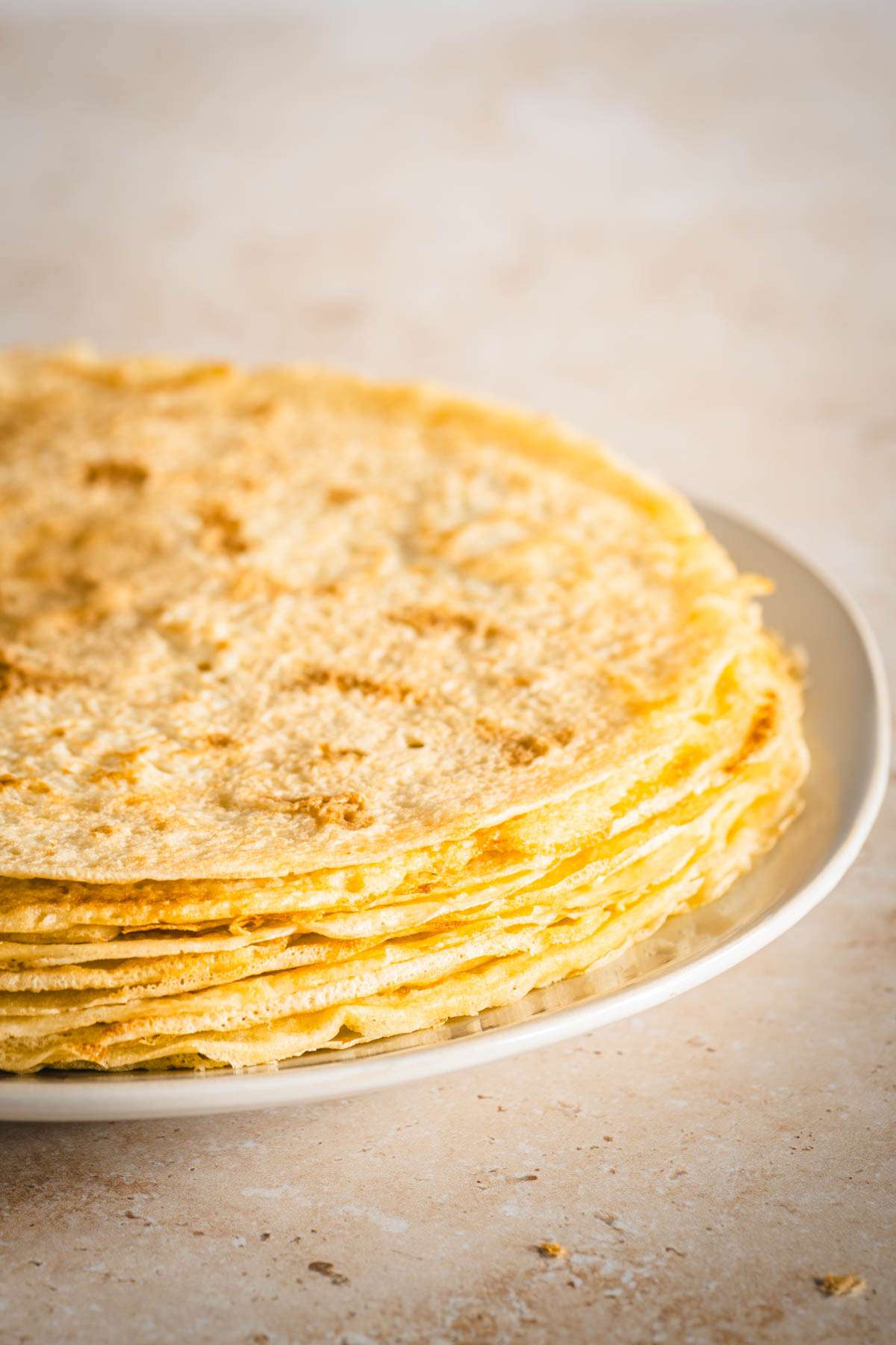 stack of nalesniki on a plate, front view