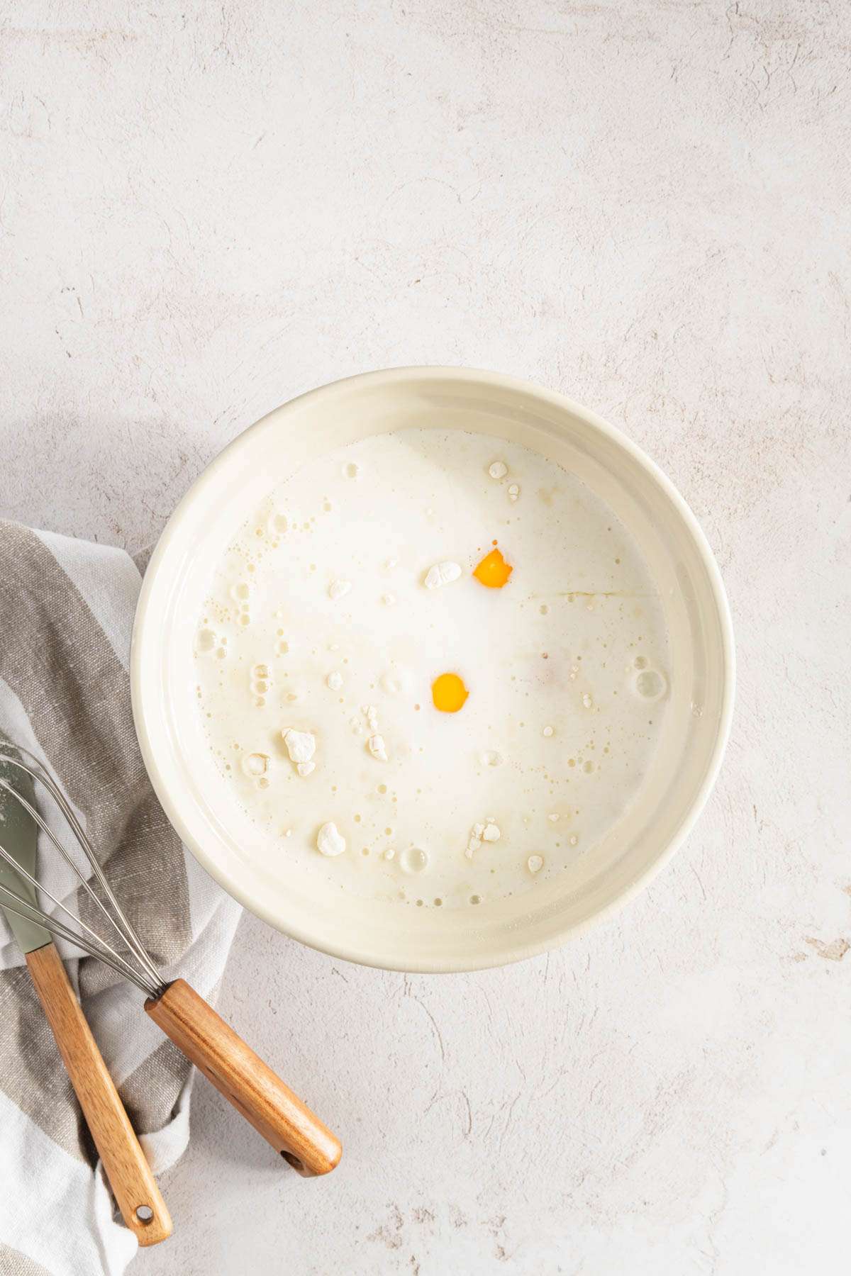 ingredients for nalesniki in a large mixing bowl