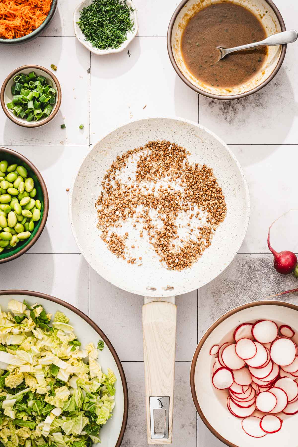 small skillet iwht toasted buckwheat, sesame seeds and caraway