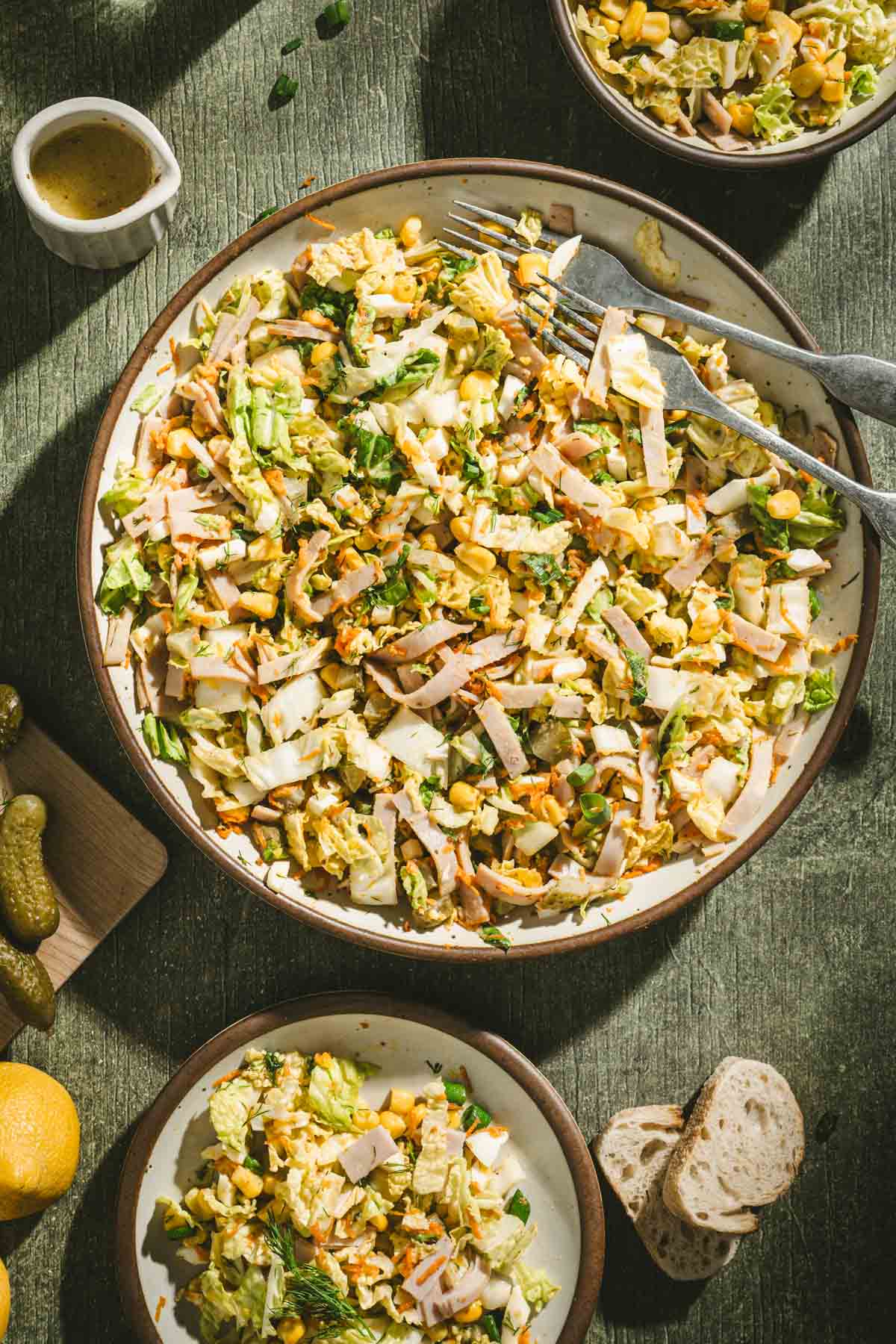 close up of a large bolw with napa salad
