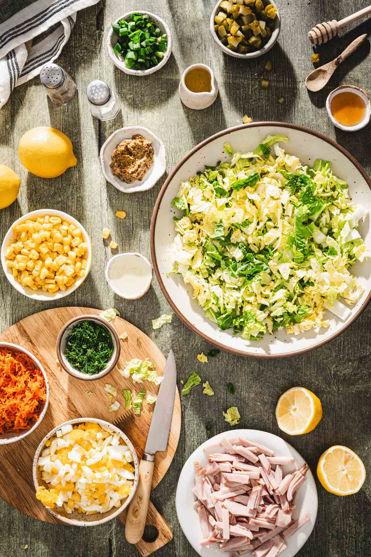 large bowl with chopped napa cabbage. other ing aroud