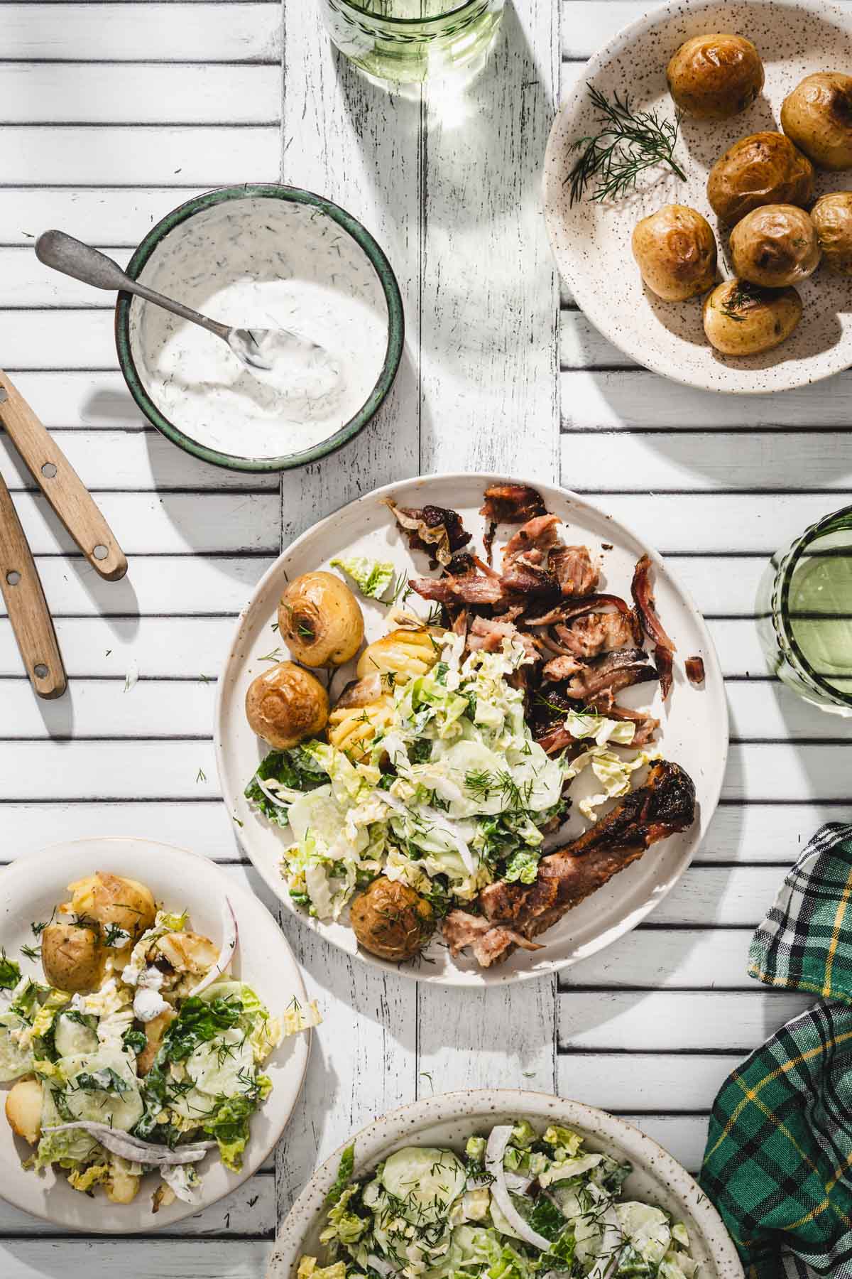 various plates with napa mizeria, ribs, potaotes