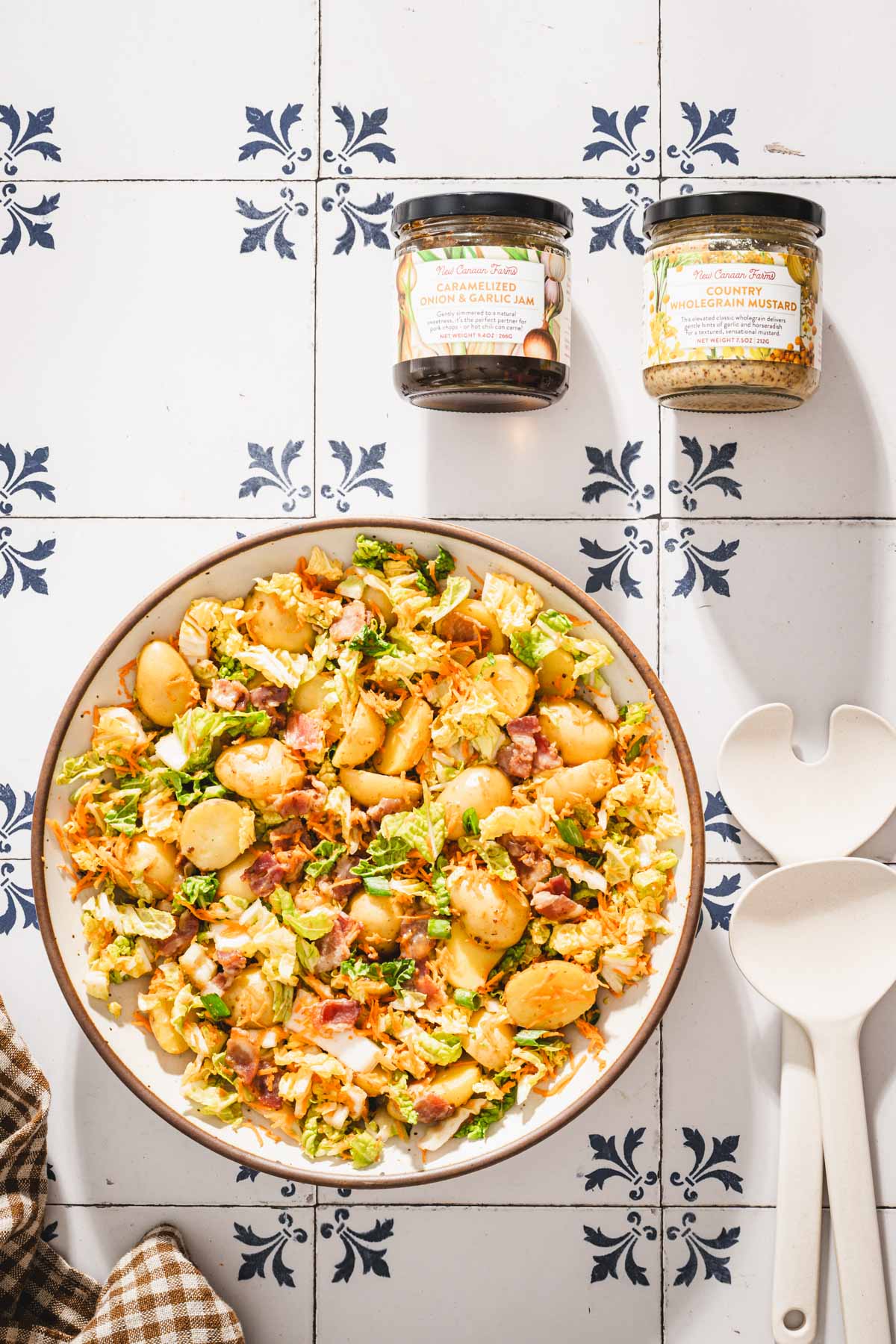 round bowl with napa salad, branded jars