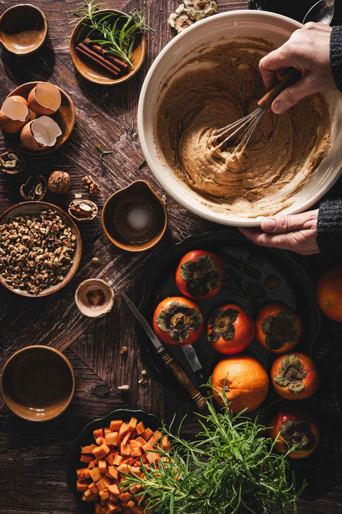 hands in frame mixing the batter