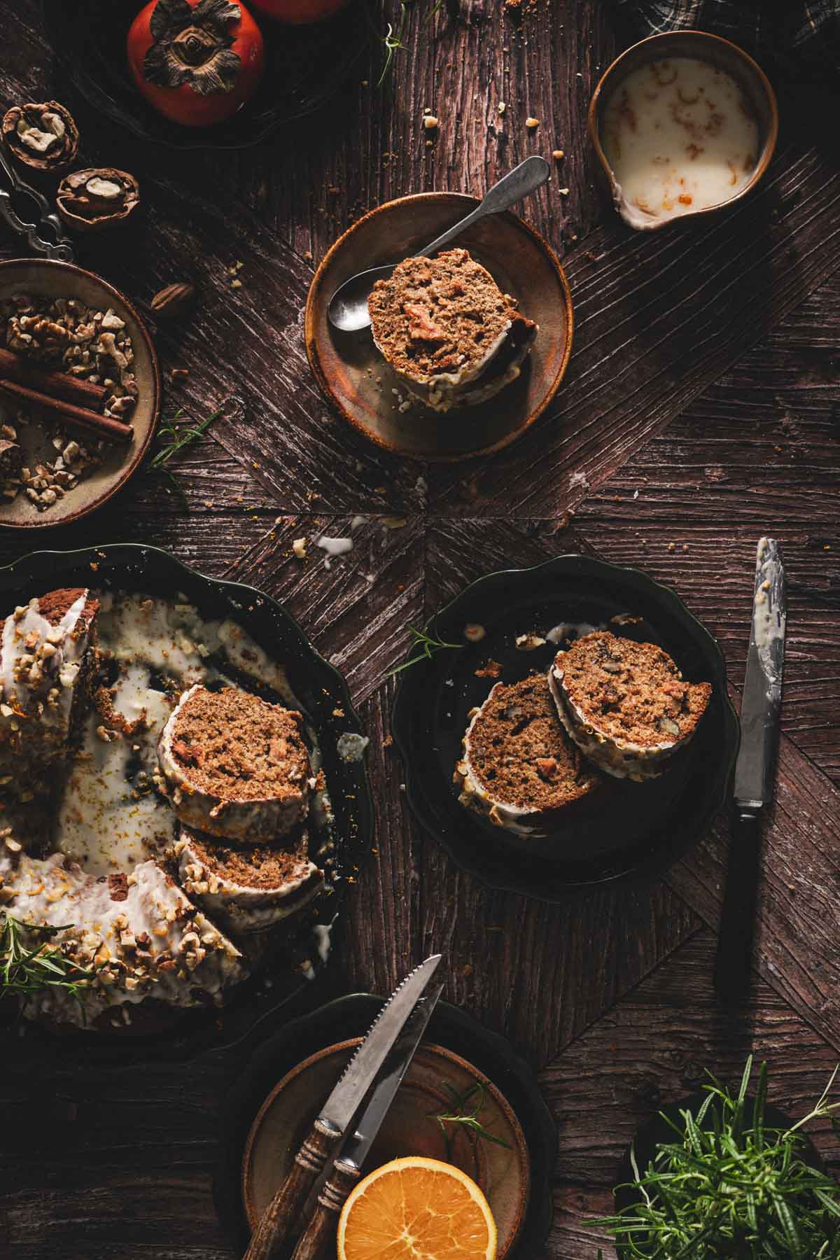 various plates with sliced cake, knivs