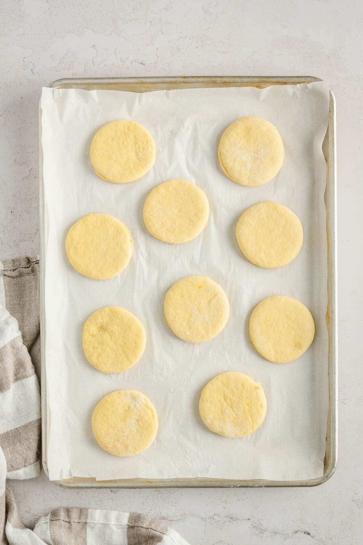 paczki cut out and arranged on a baking sheet