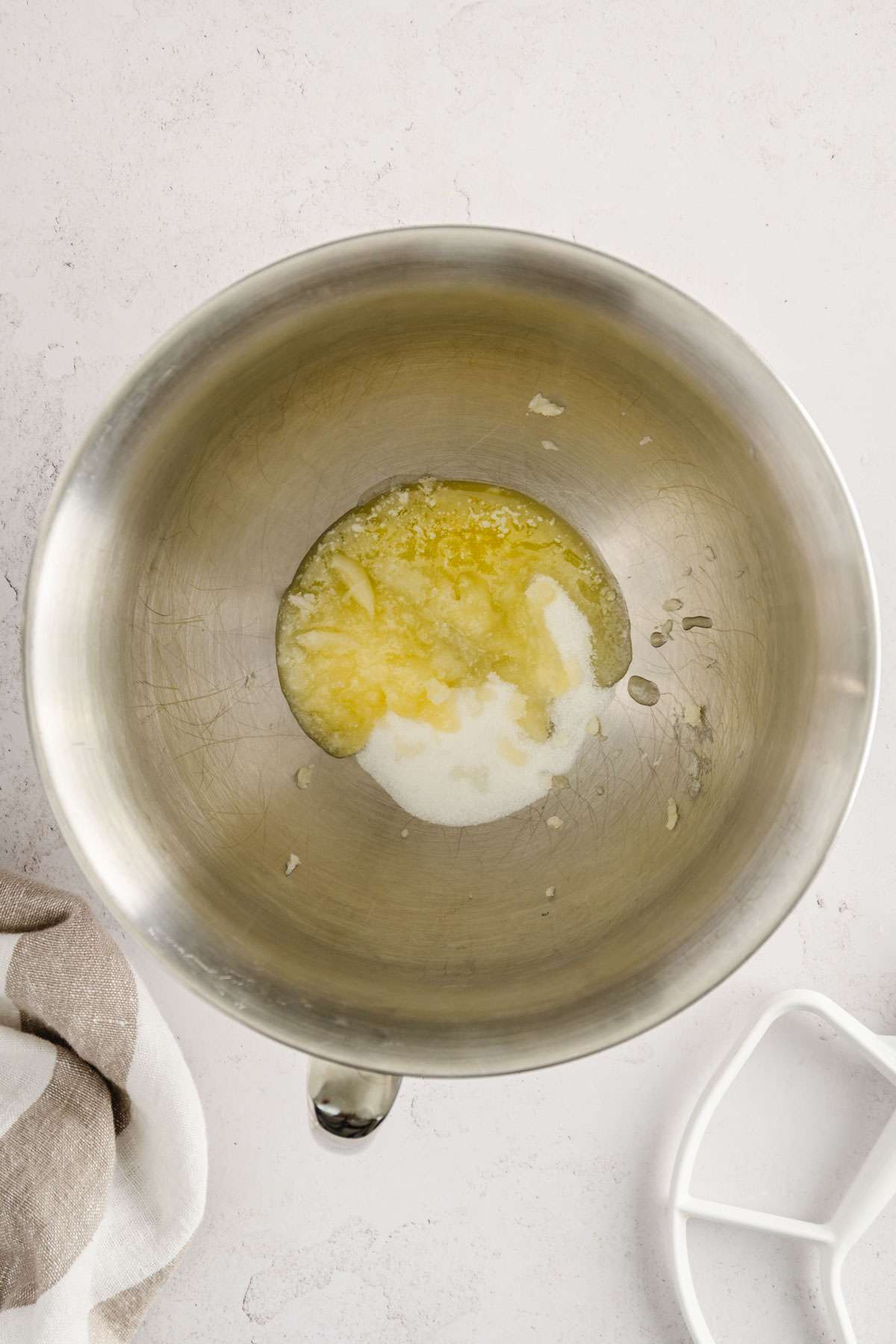 sugar and egg in a bowl of stand mixer