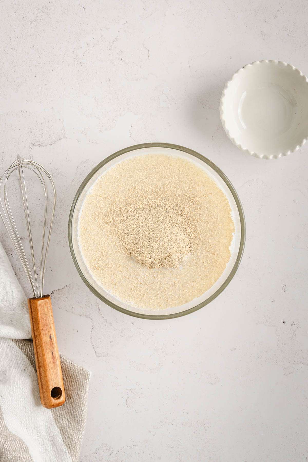 yeast added to the bowl with milk