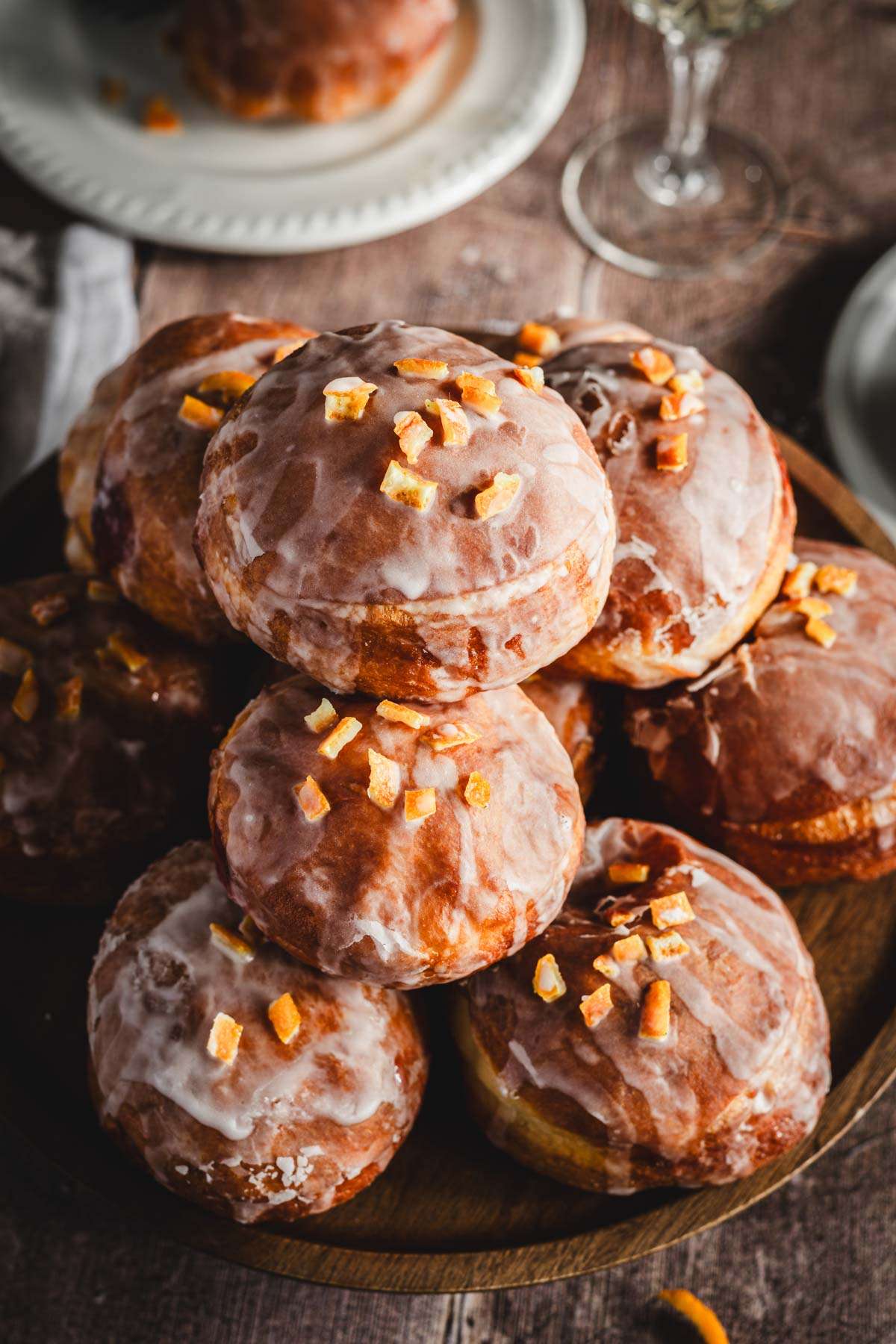 close up of paczki arranged on a platter