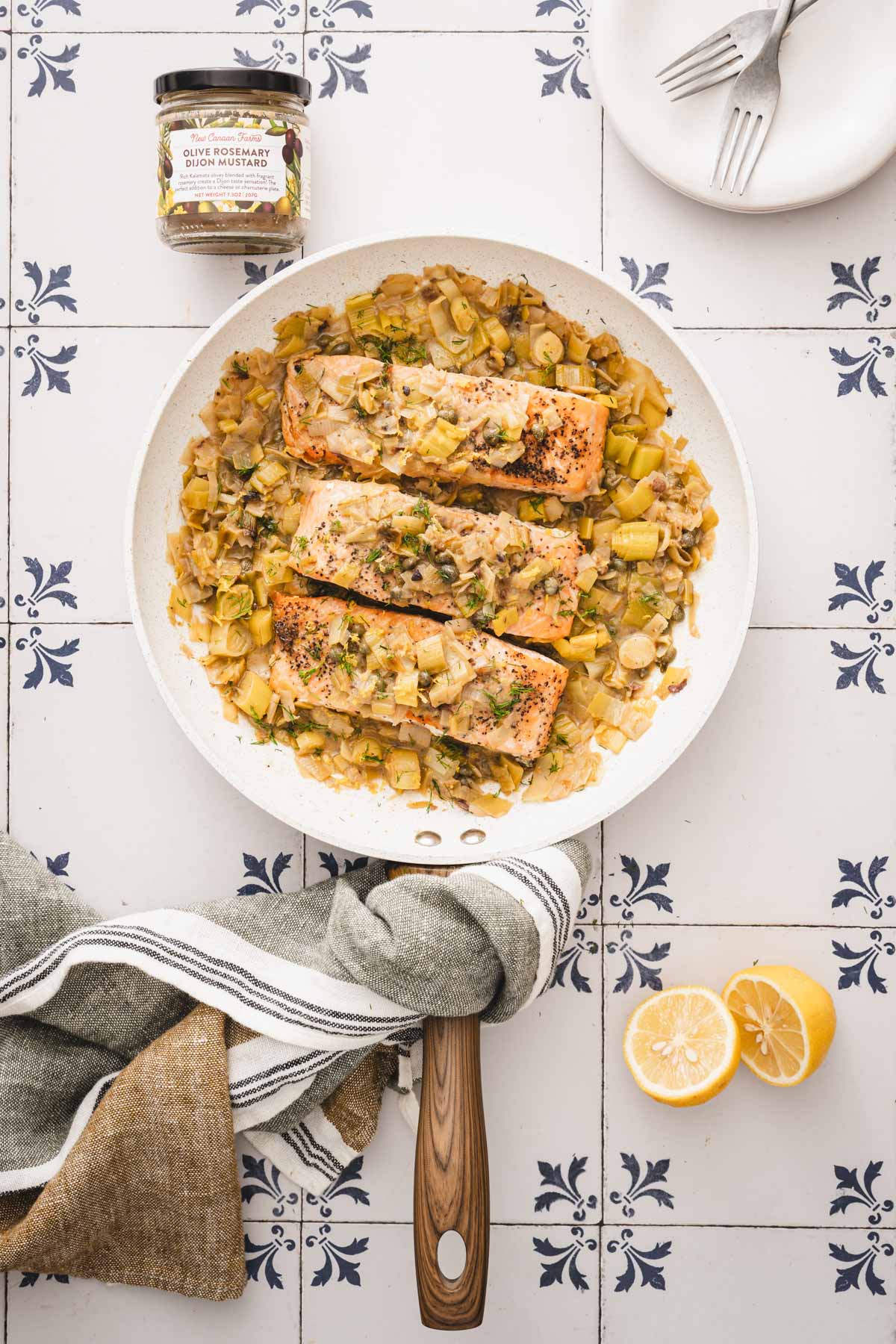 salmon added to the skillet with the sauce