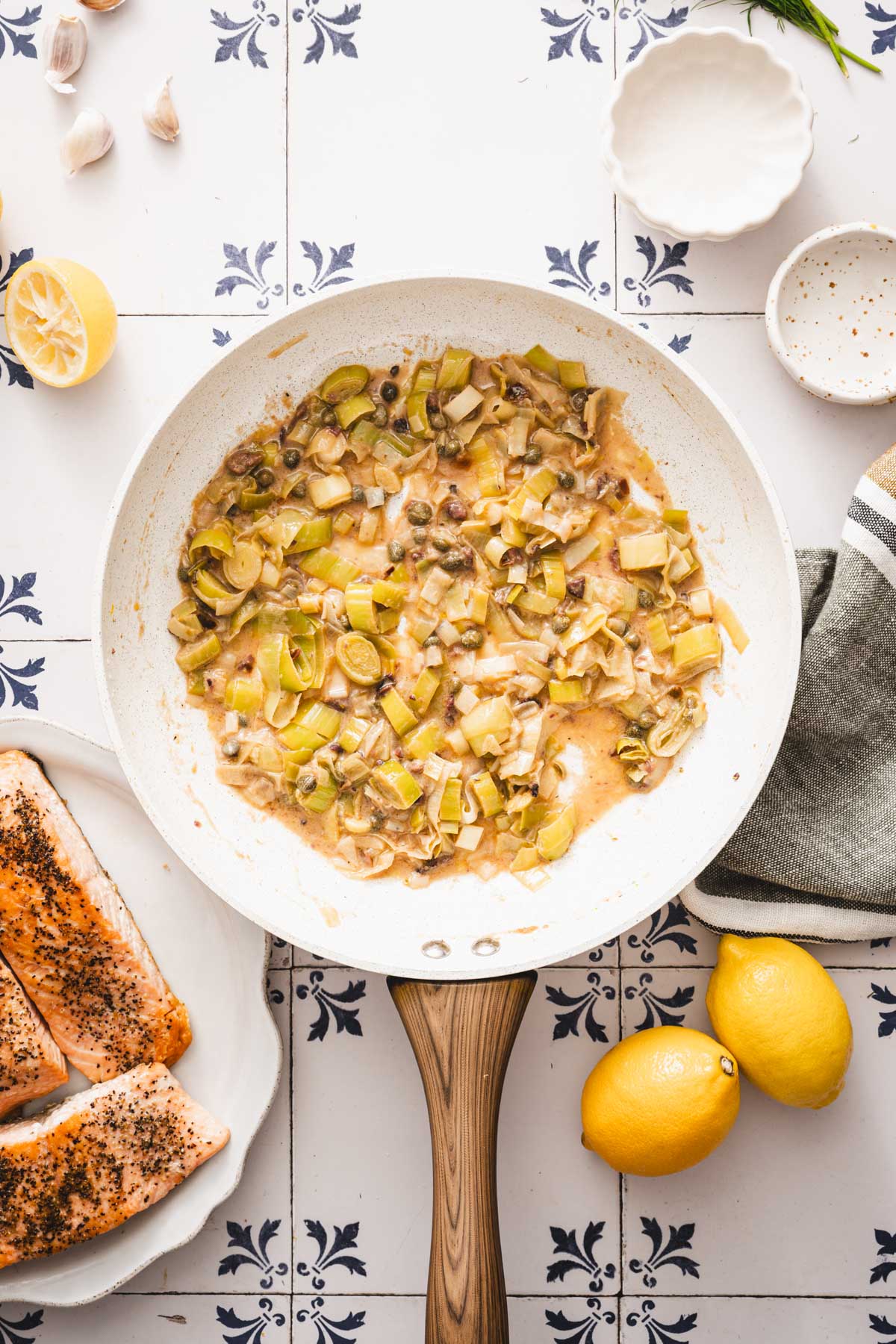leeks mustard sauce in a skillet