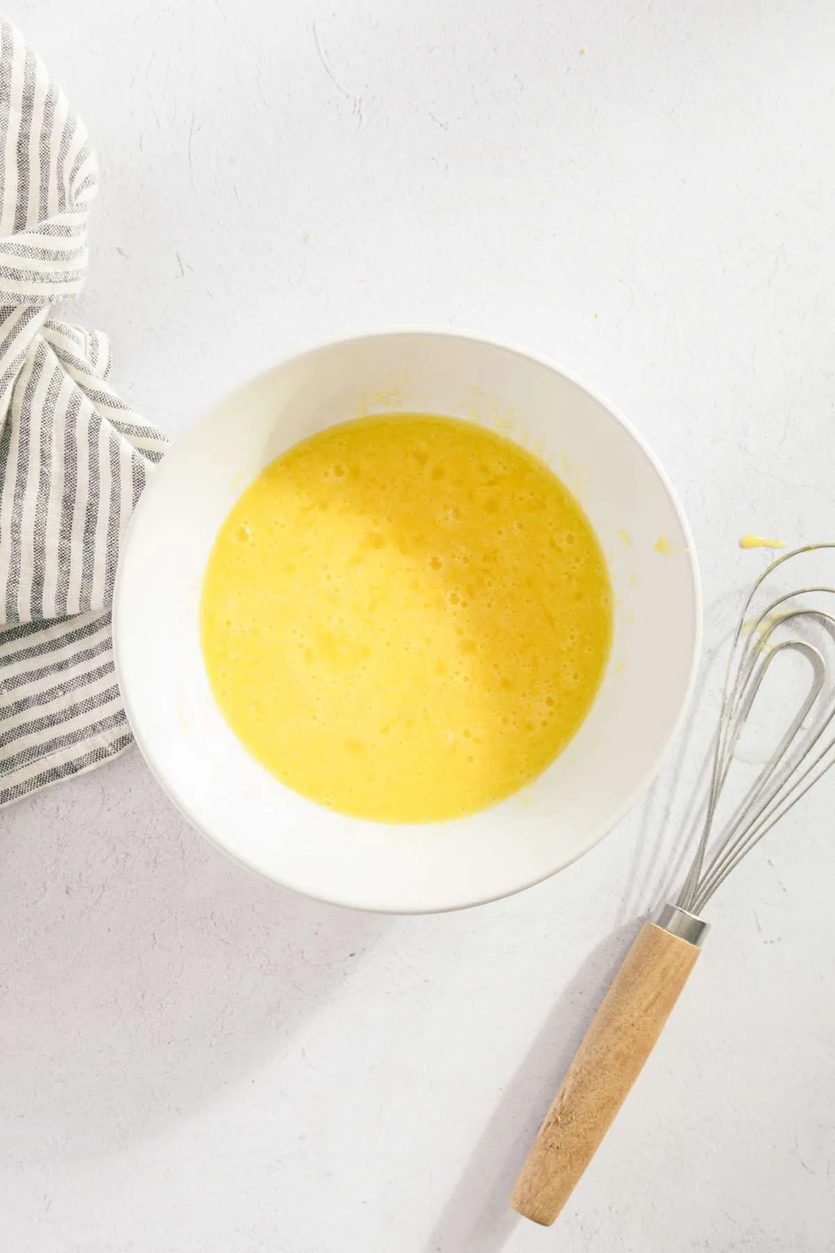 bowl with sugar and eggs mixed together