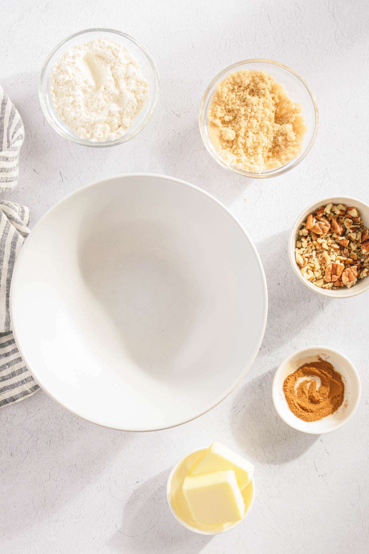 empty bowl, small bowls with ingredients for the topping