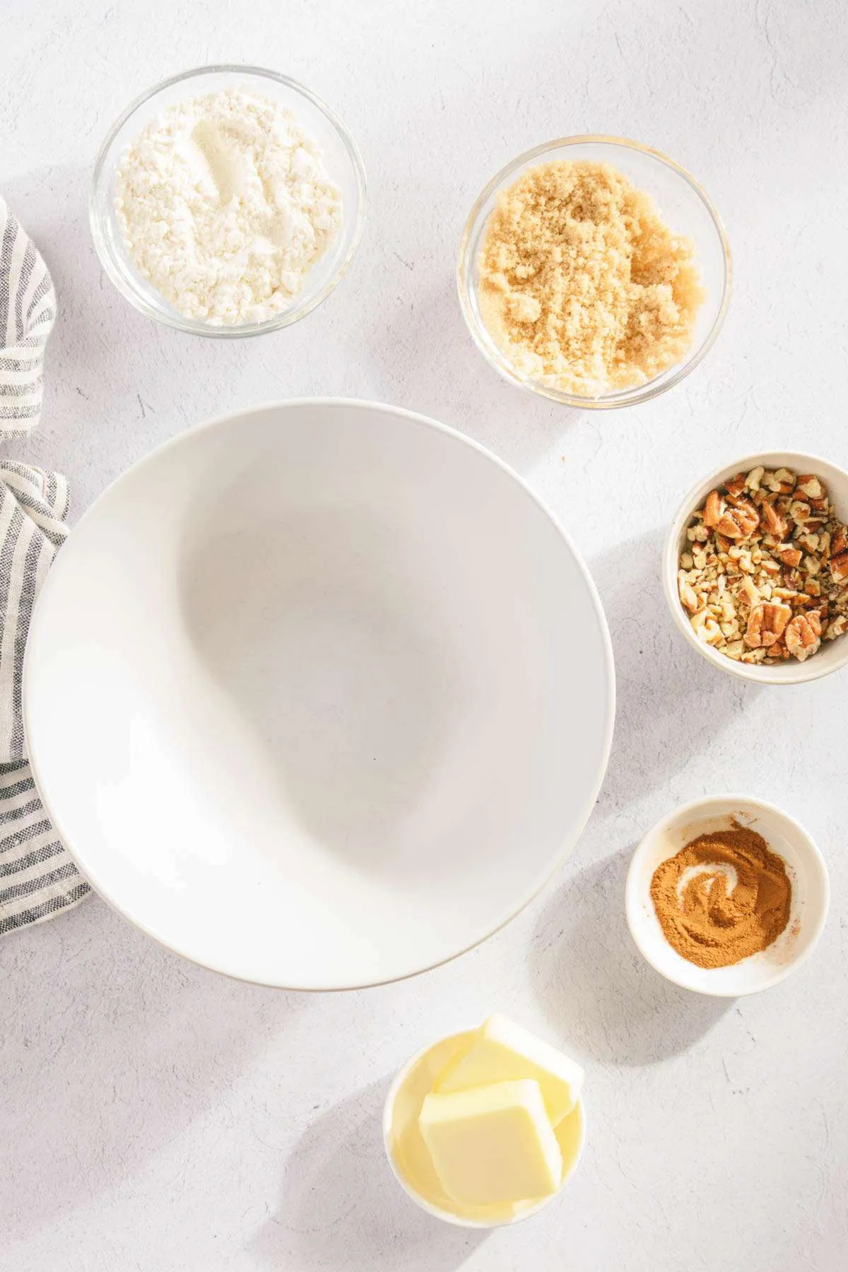 empty bowl, small bowls with ingredients for the topping