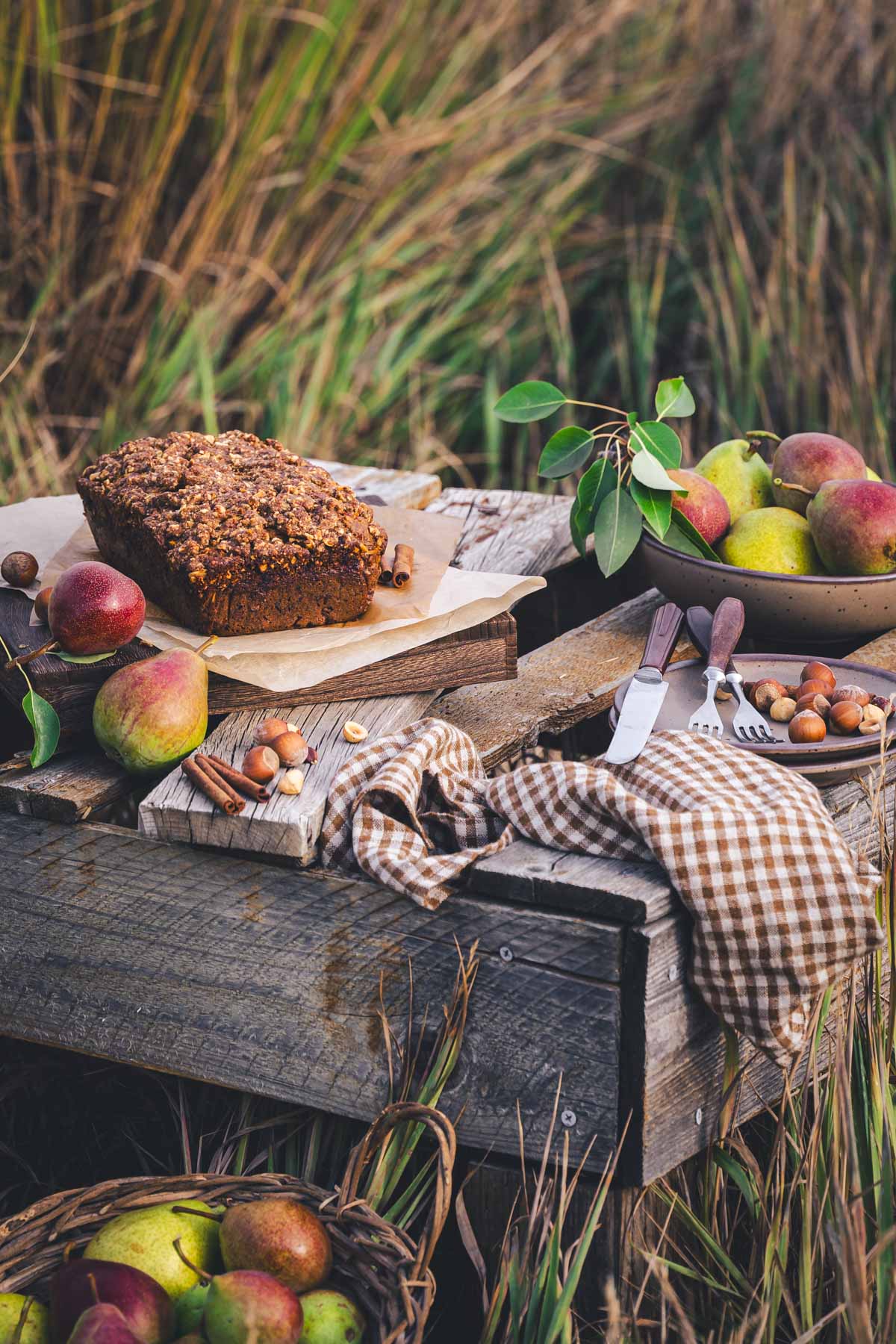 close up of a pear bread on a wooden table in the garden