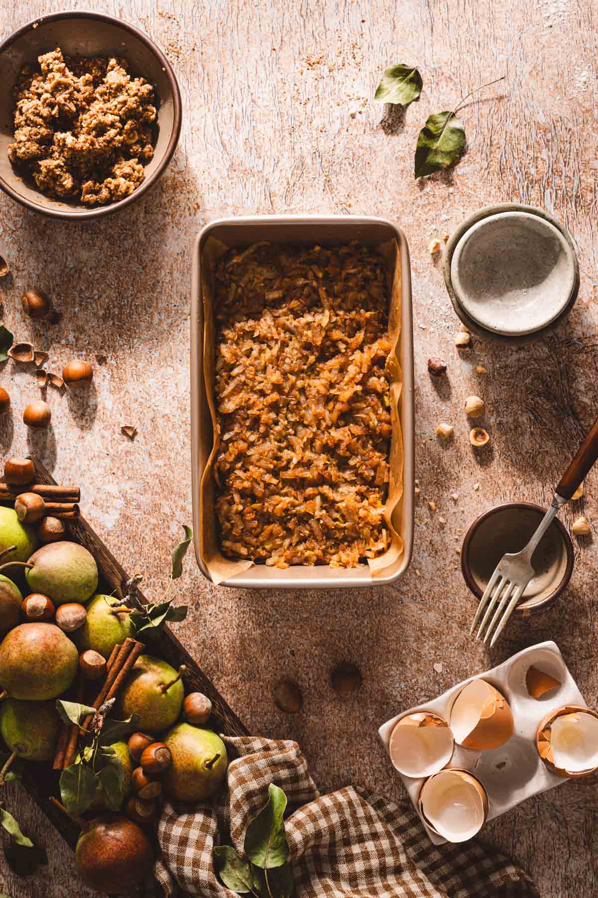 baking pan with the batter, topped with grated pears