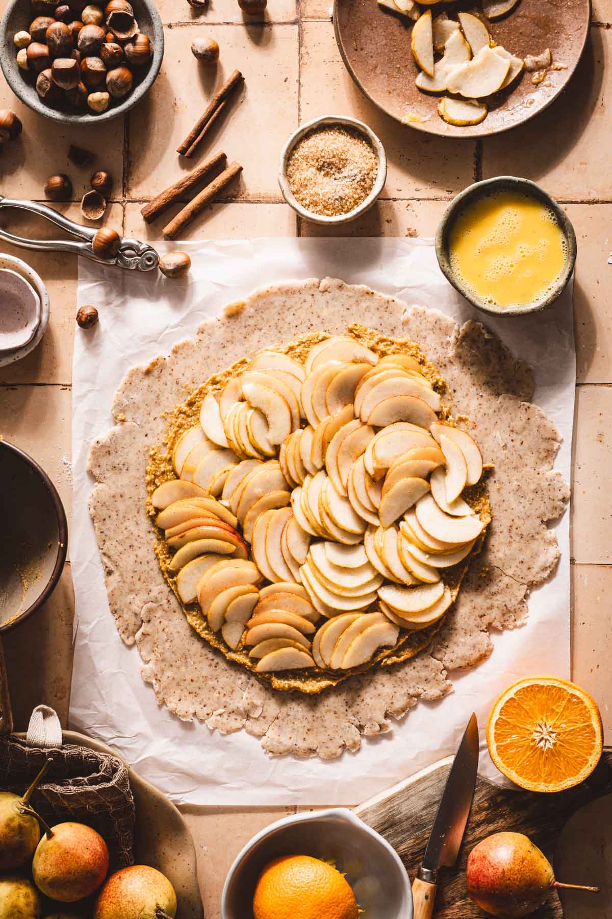 dough covered with sliced pears