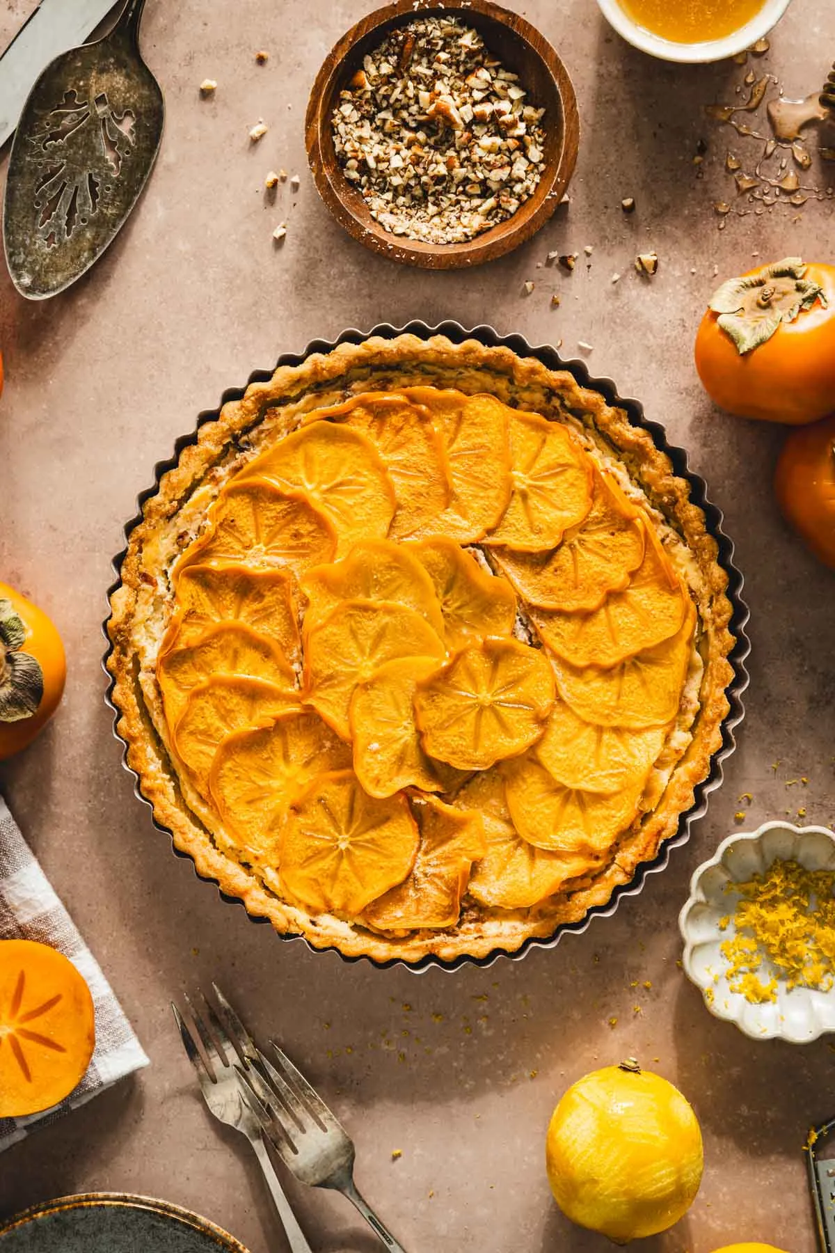 baked persimmon tart still in the baking form