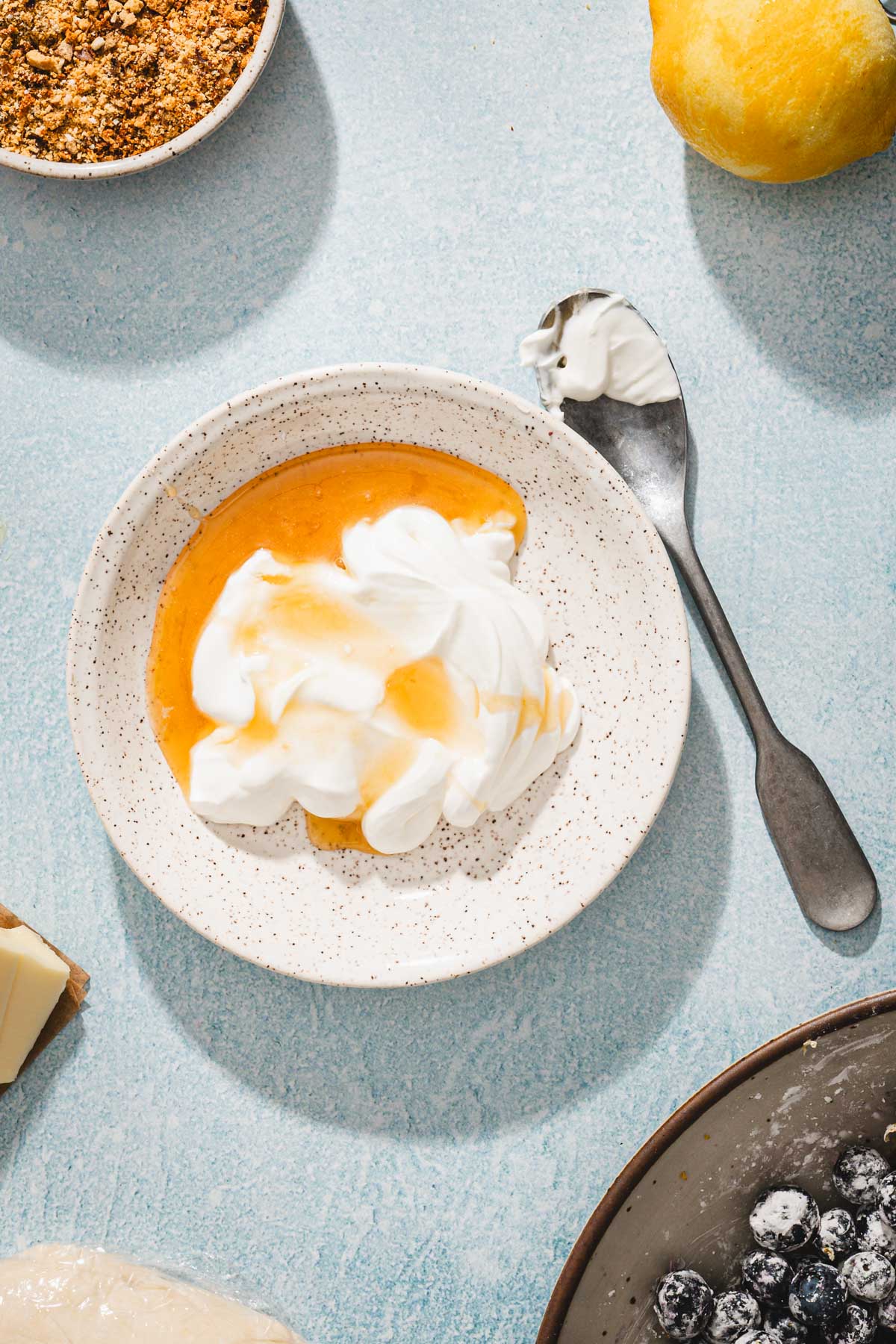 small dish with sour cream and honey